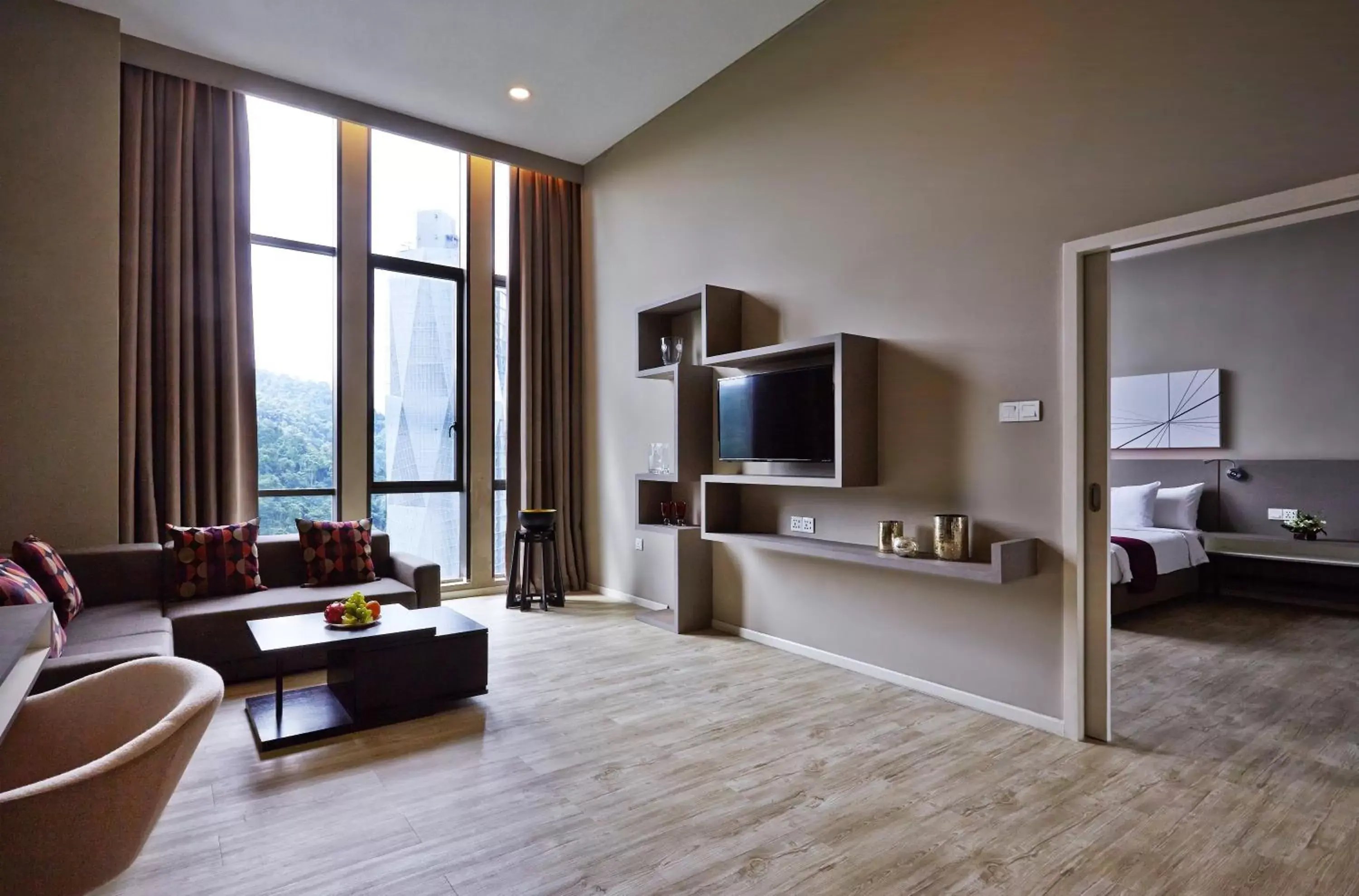 Living room, TV/Entertainment Center in Qliq Damansara Hotel