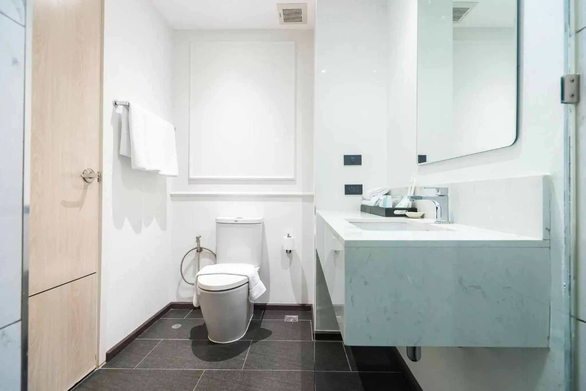 Toilet, Bathroom in One Patio Hotel Pattaya - SHA Extra Plus