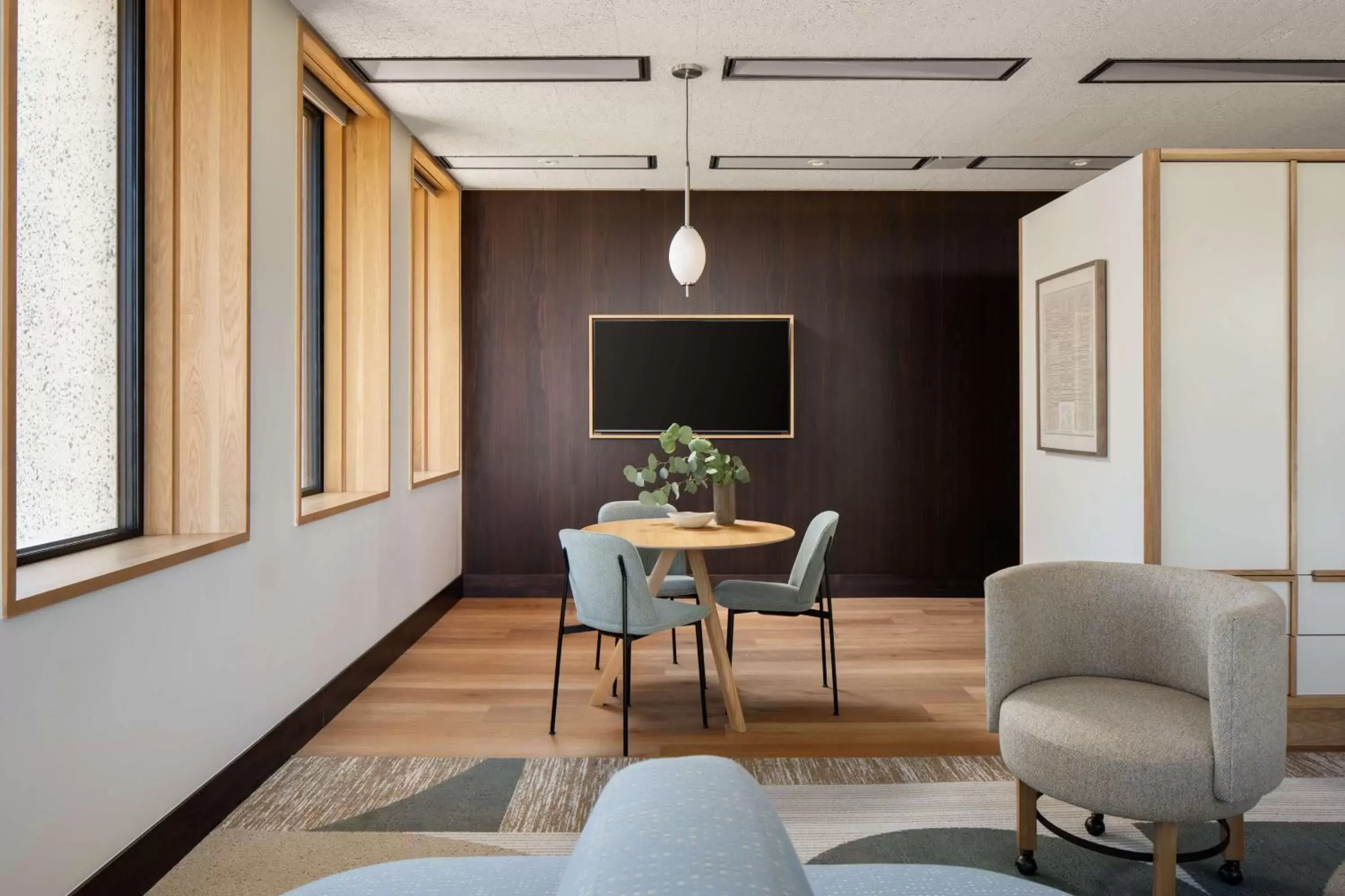 Living room, TV/Entertainment Center in Hotel Marcel New Haven, Tapestry Collection By Hilton