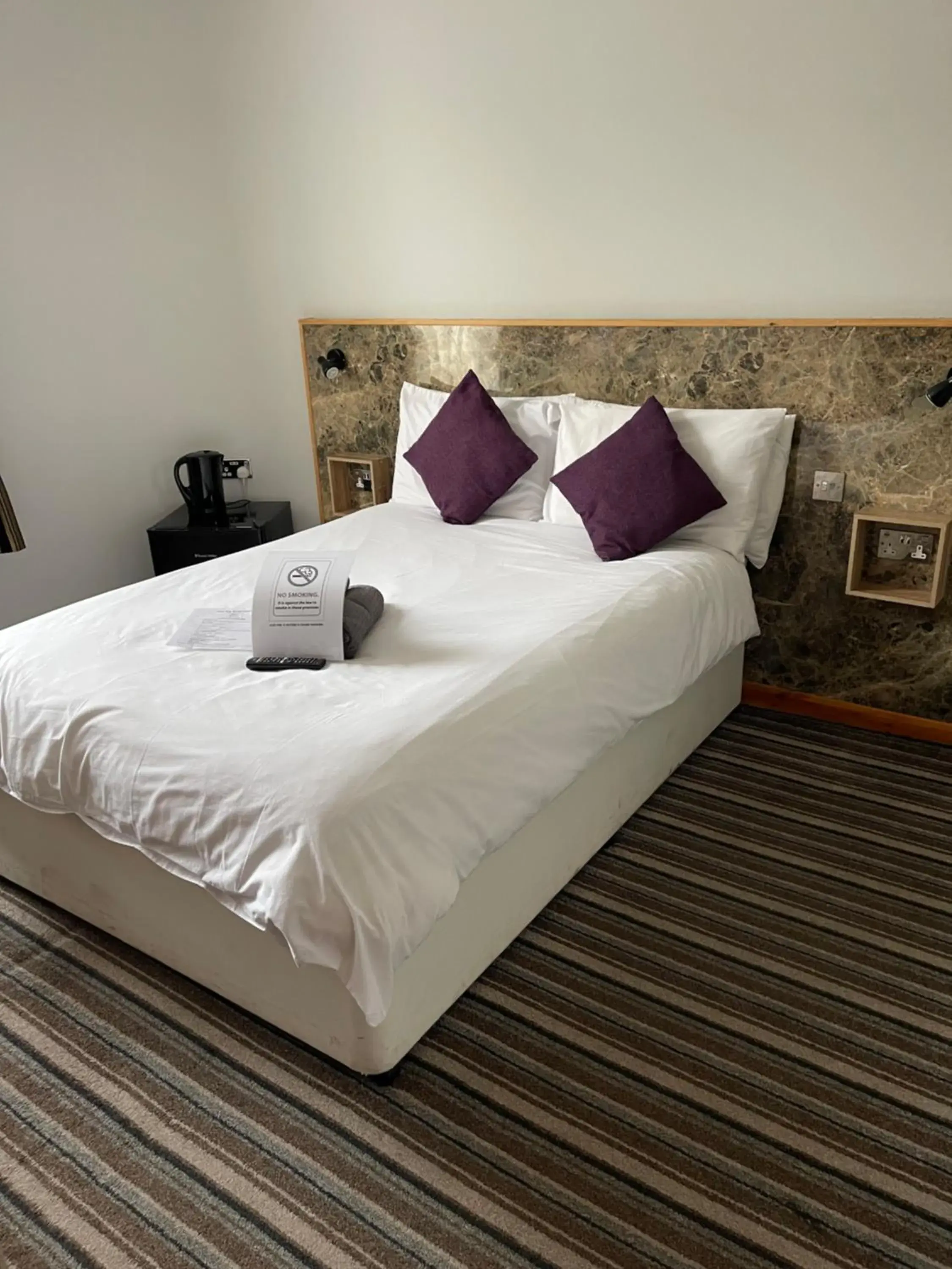 Bed in The Six Bells Hotel