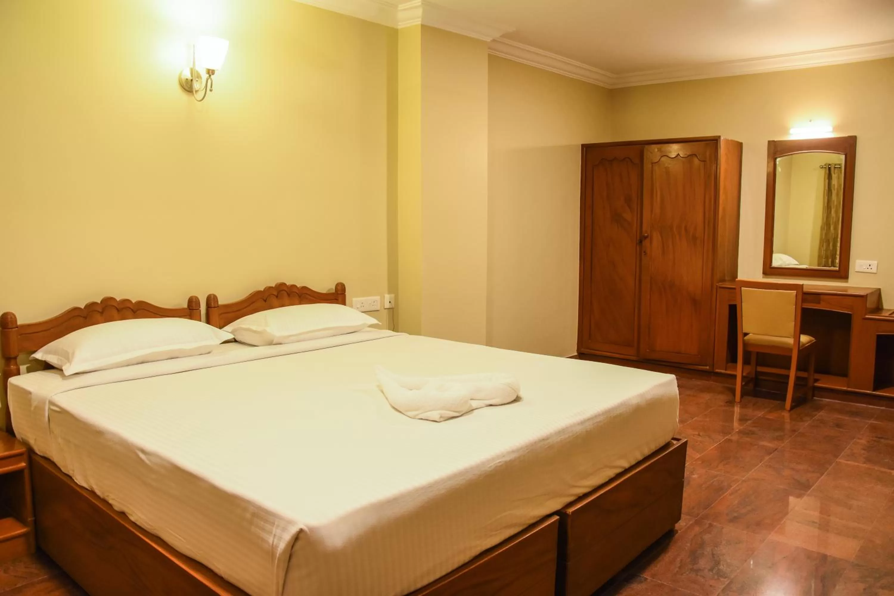 Bed in Poppys Tower Tiruppur