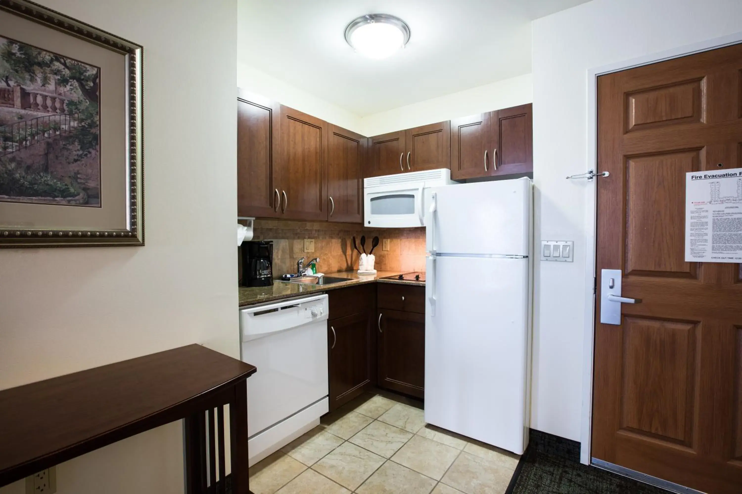 Photo of the whole room, Kitchen/Kitchenette in Staybridge Suites Austin Airport, an IHG Hotel