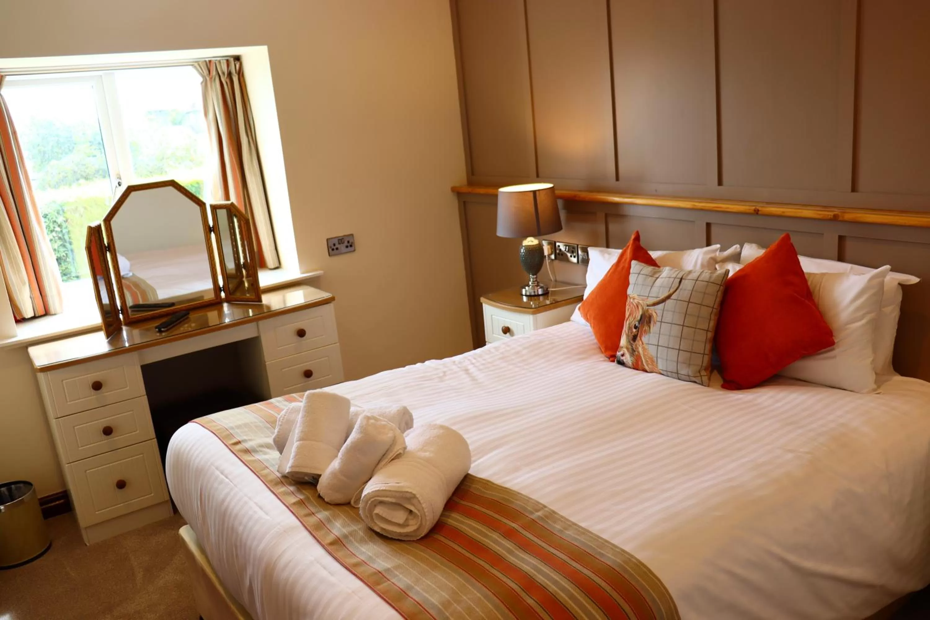 Bed in Lion Hotel & Studio Apartments