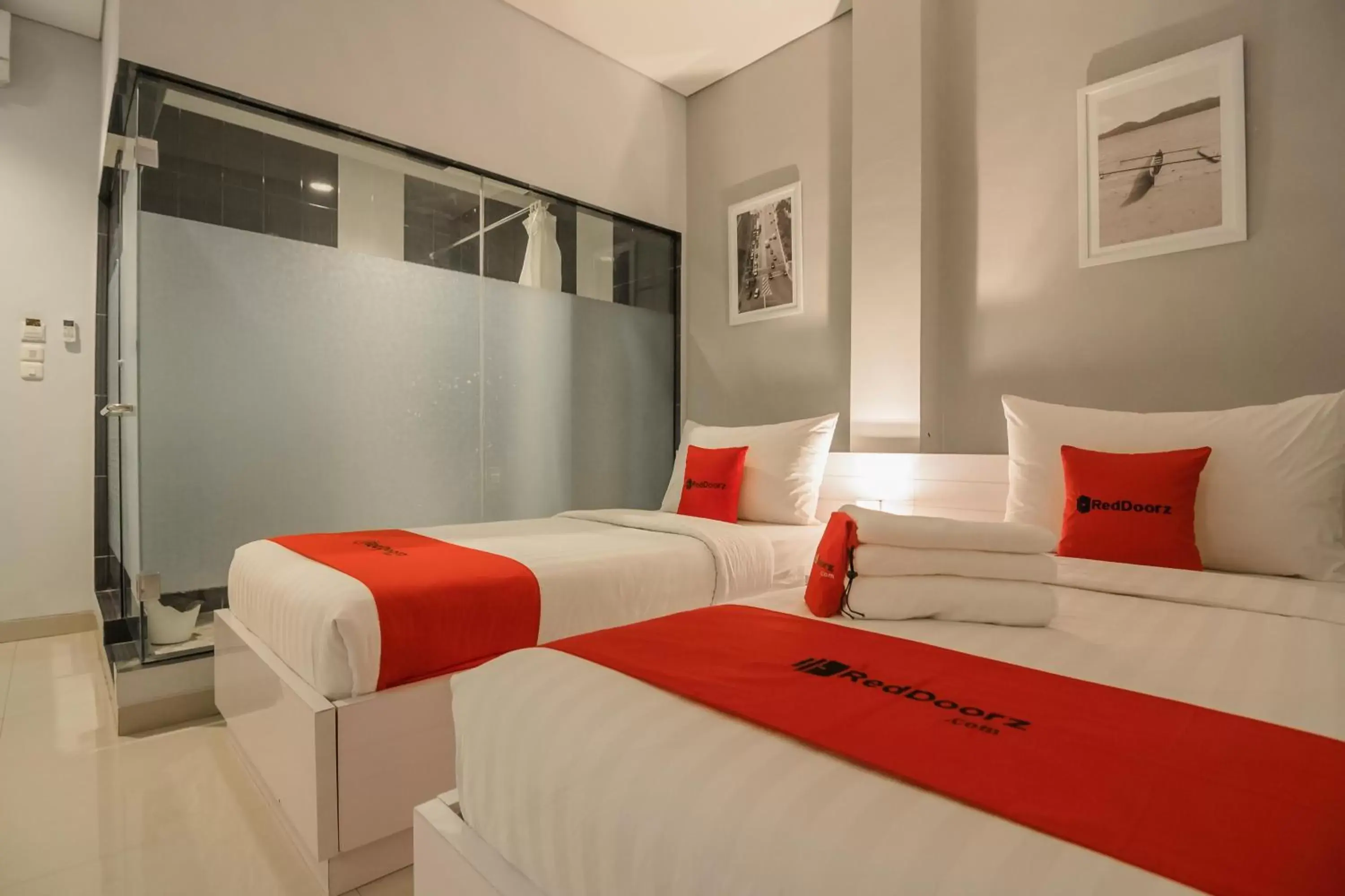 Photo of the whole room, Bed in RedDoorz Plus near Soekarno Hatta Airport 2