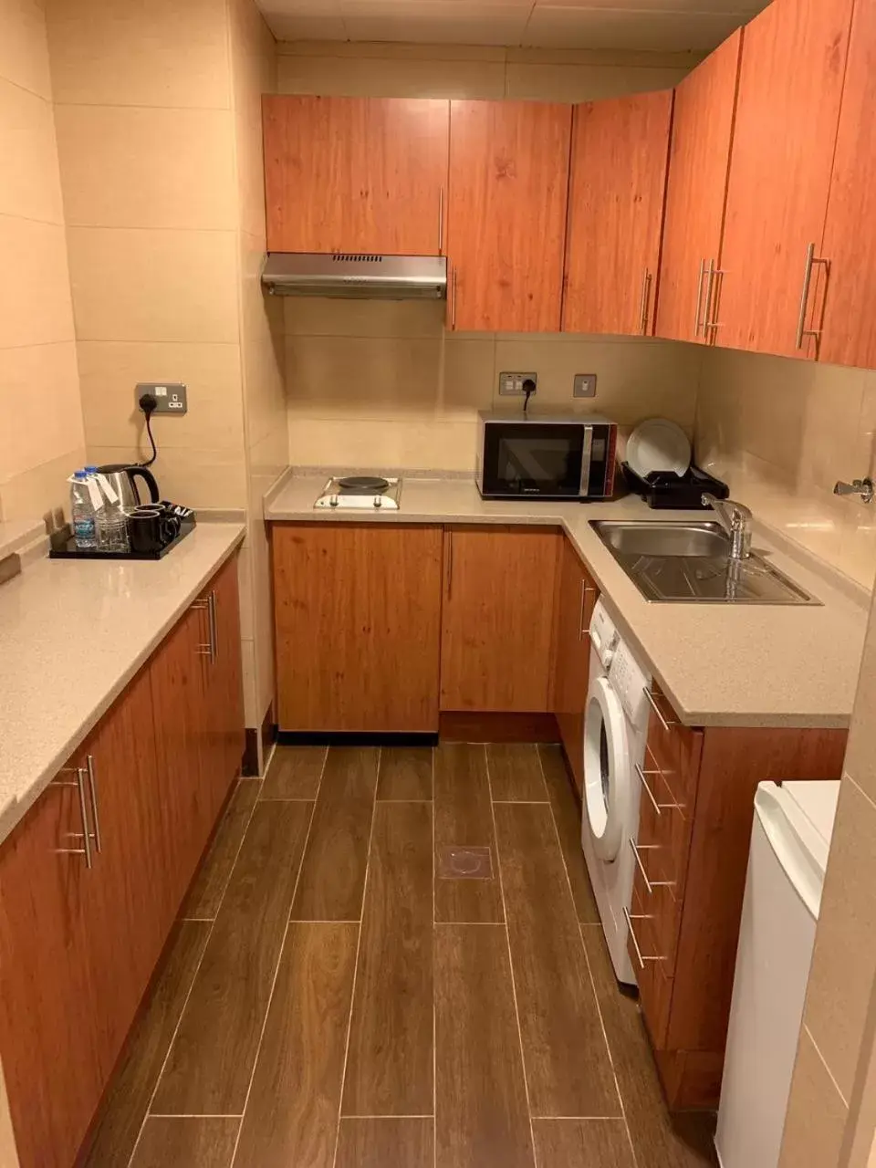 Kitchen/Kitchenette in Paragon Hotel Apartments