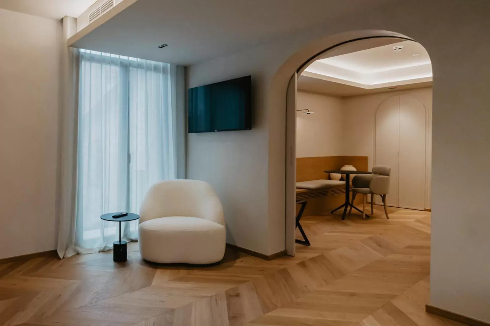 TV and multimedia, Seating Area in Hotel Boutique Petit Luxe