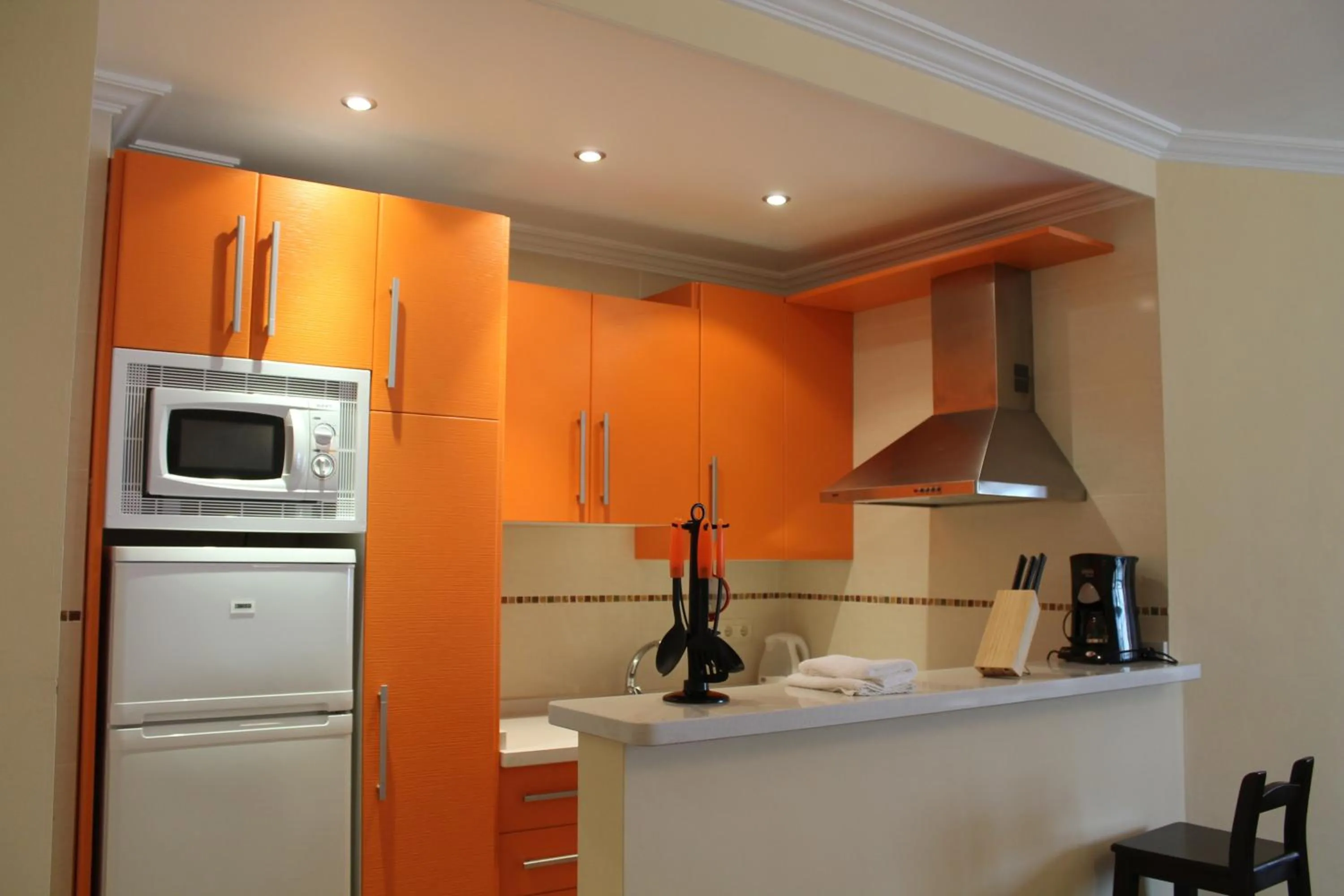 Kitchen or kitchenette in Apartamentos Turísticos Plaza del Olvido