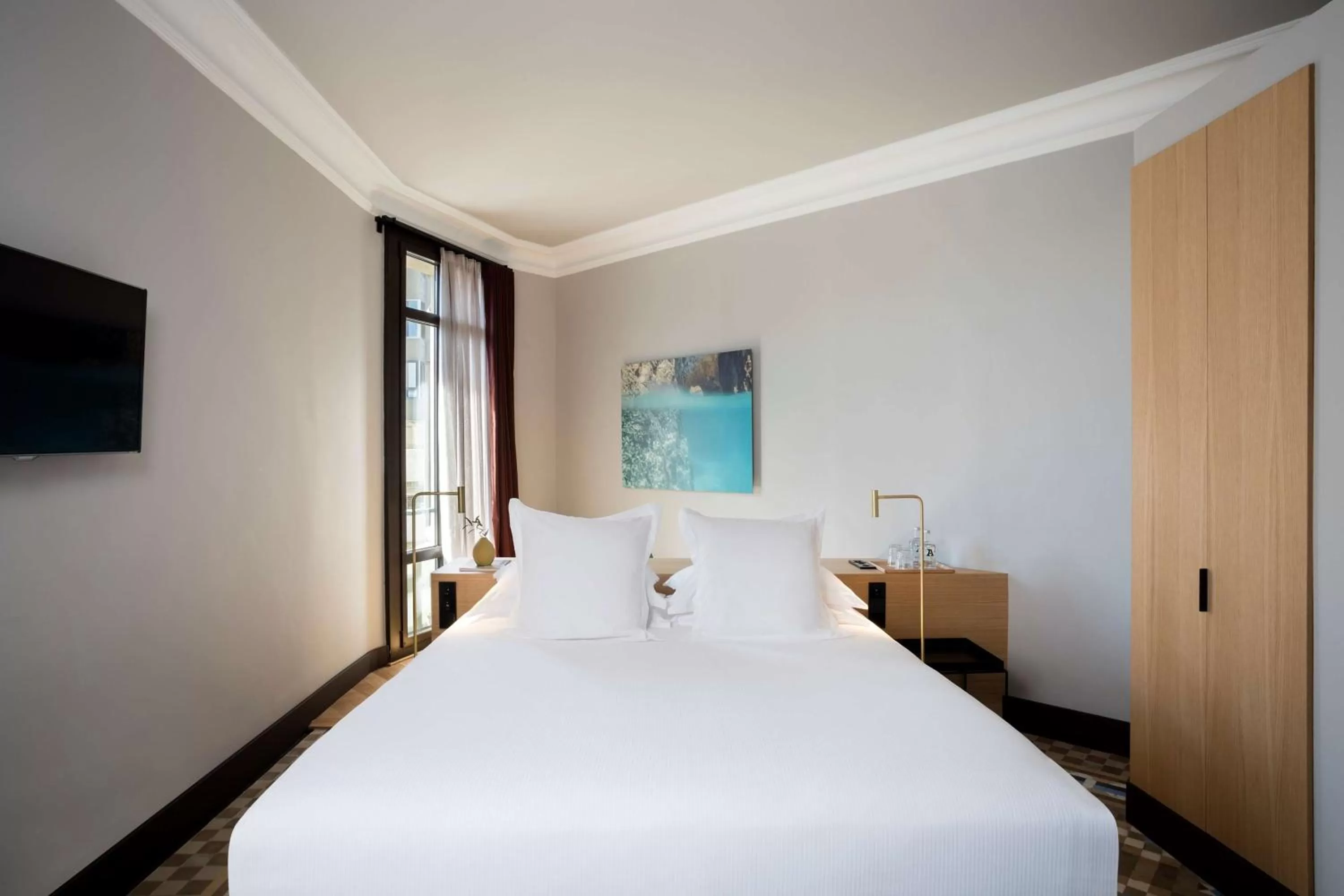 Bed in Alexandra Barcelona Hotel, Curio Collection by Hilton