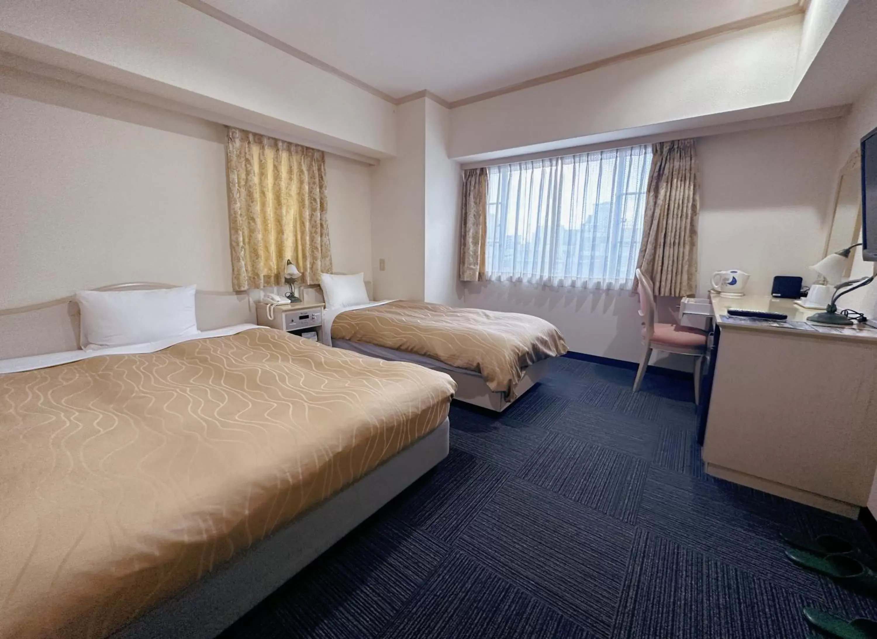 Photo of the whole room, Bed in Nissei Hotel Fukuoka