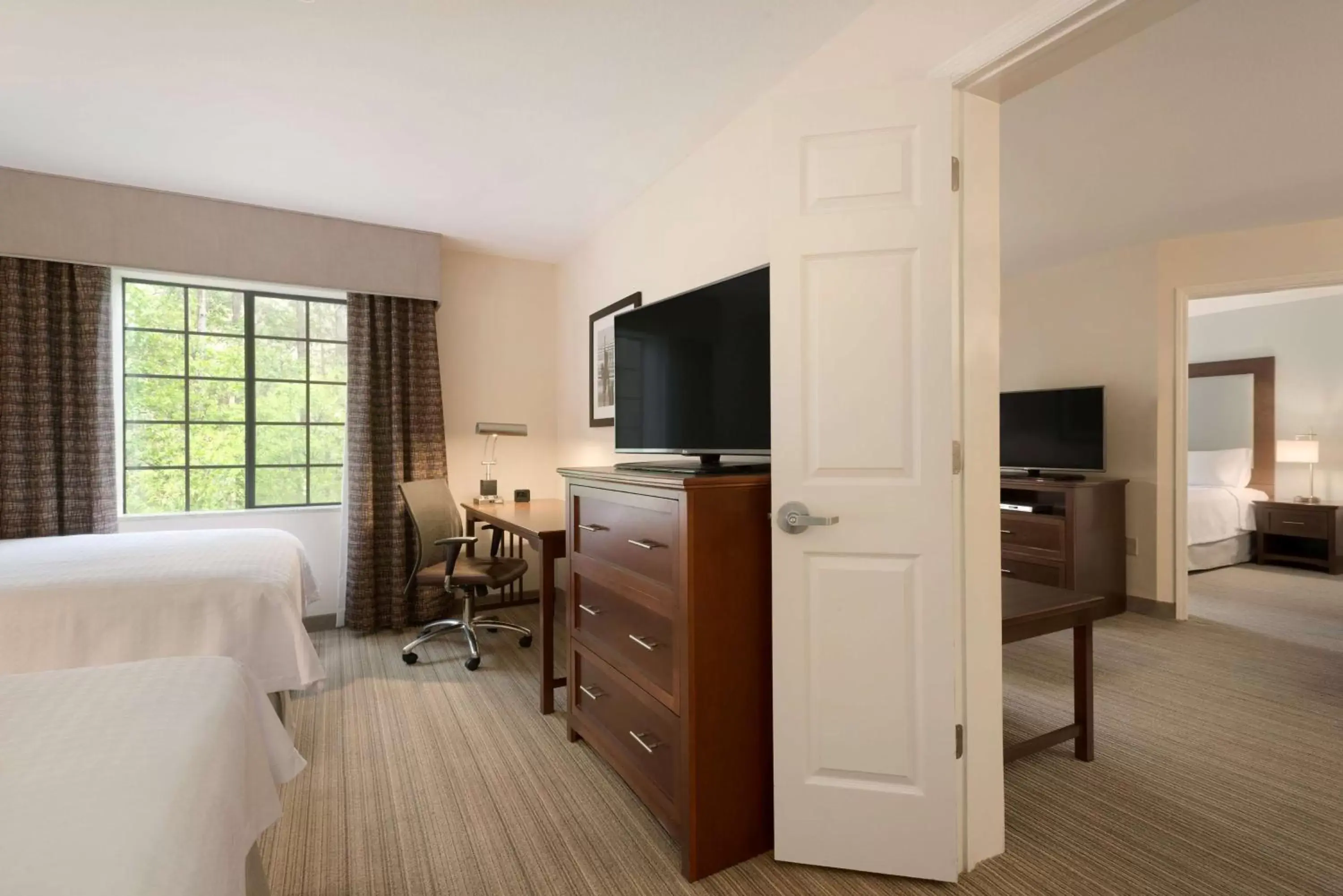 Two-Bedroom Suite with One King Bed and Two Queen Beds in Homewood Suites Jacksonville Deerwood Park