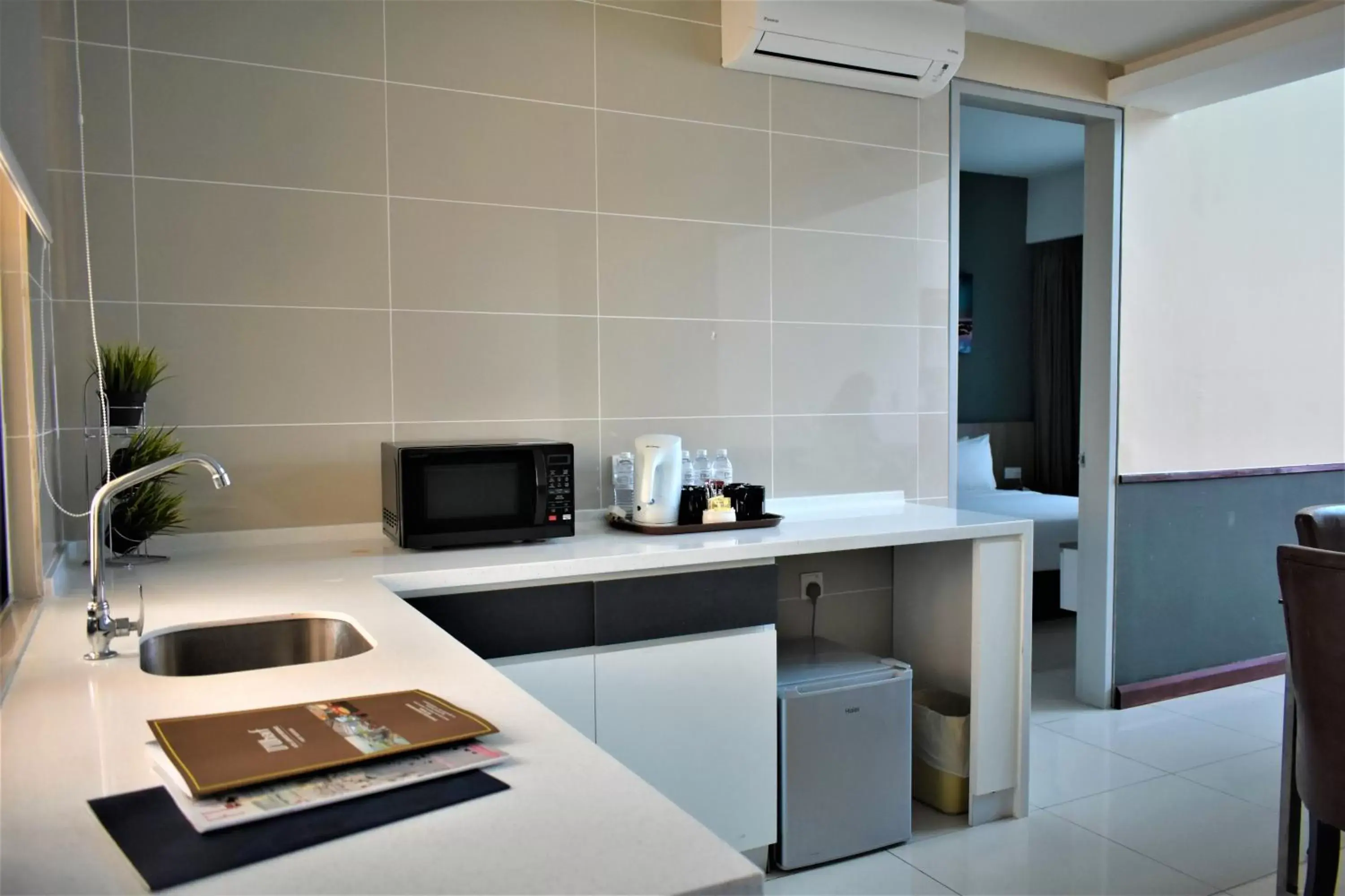 Kitchen or kitchenette, Kitchen/Kitchenette in D'Wharf Hotel & Serviced Residence