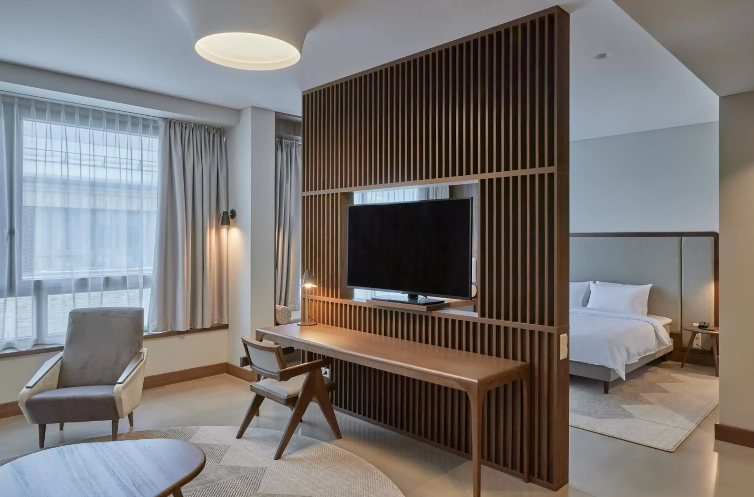 Bed, TV/Entertainment Center in Neringa Hotel