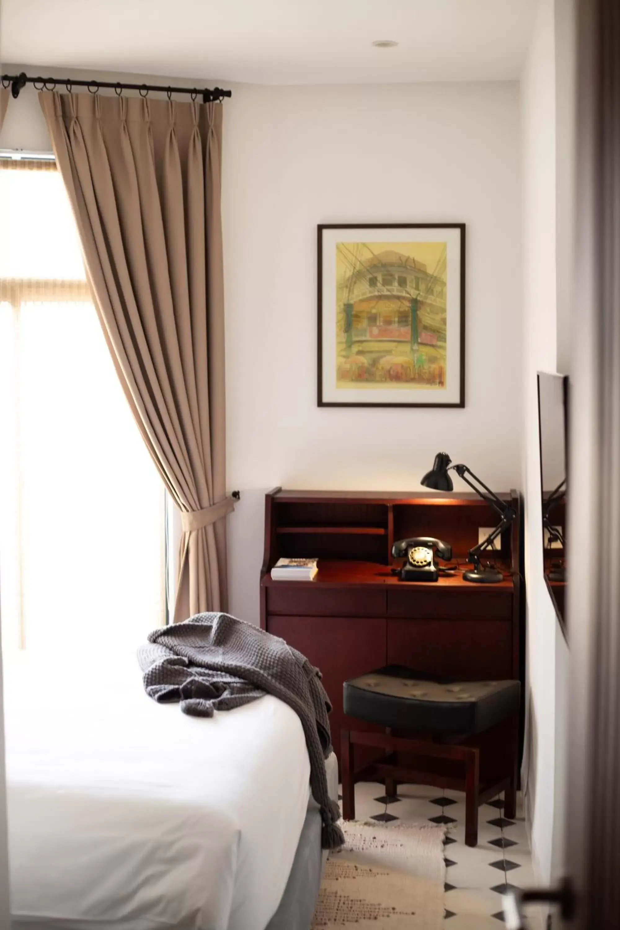 Seating area, Bed in La Chronique Hotel Seating area, Bed in La Chronique Hotel