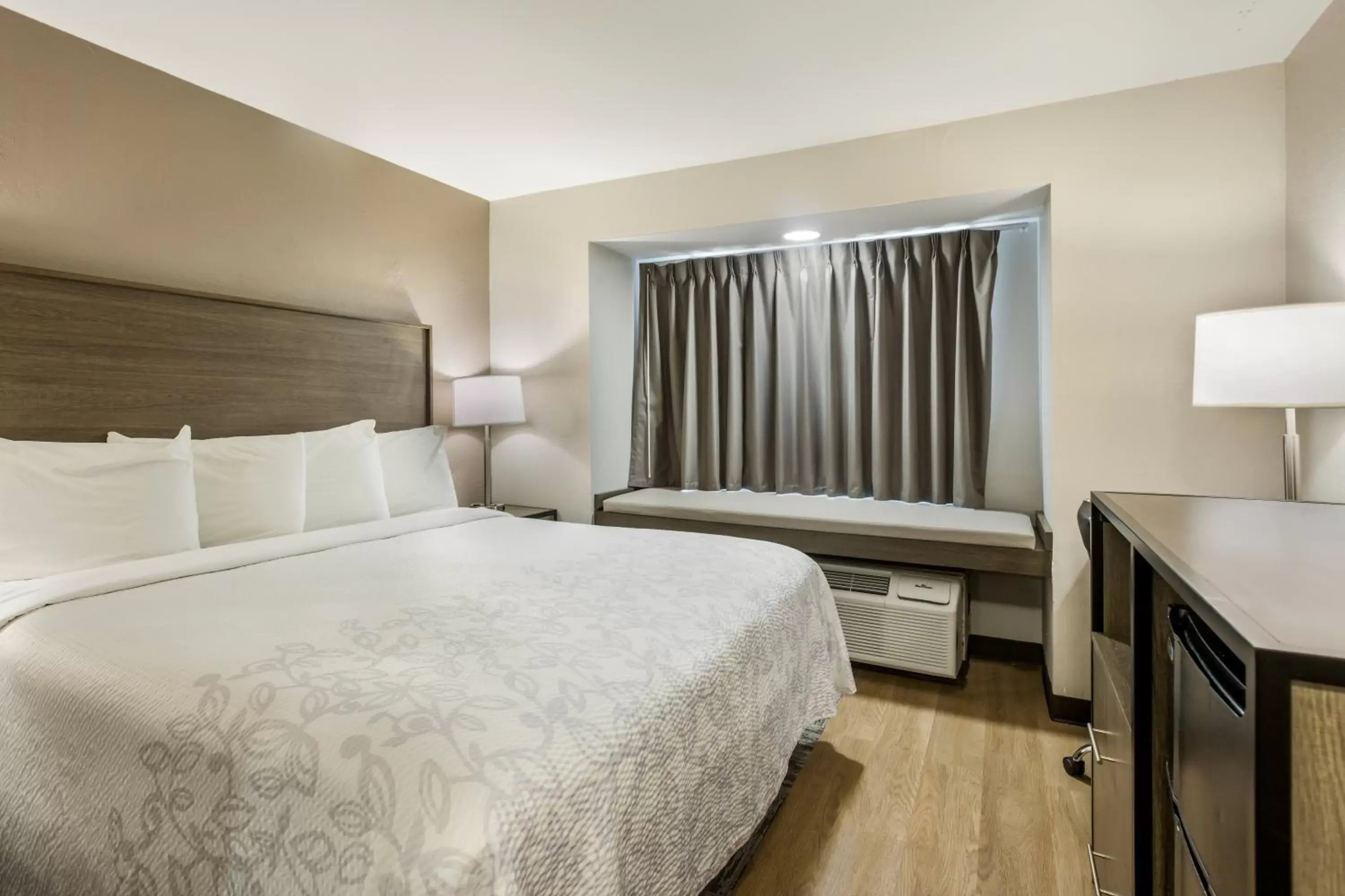 Photo of the whole room, Bed in Red Roof Inn PLUS+ & Suites Savannah – I-95 Photo of the whole room, Bed in Red Roof Inn PLUS+ & Suites Savannah – I-95