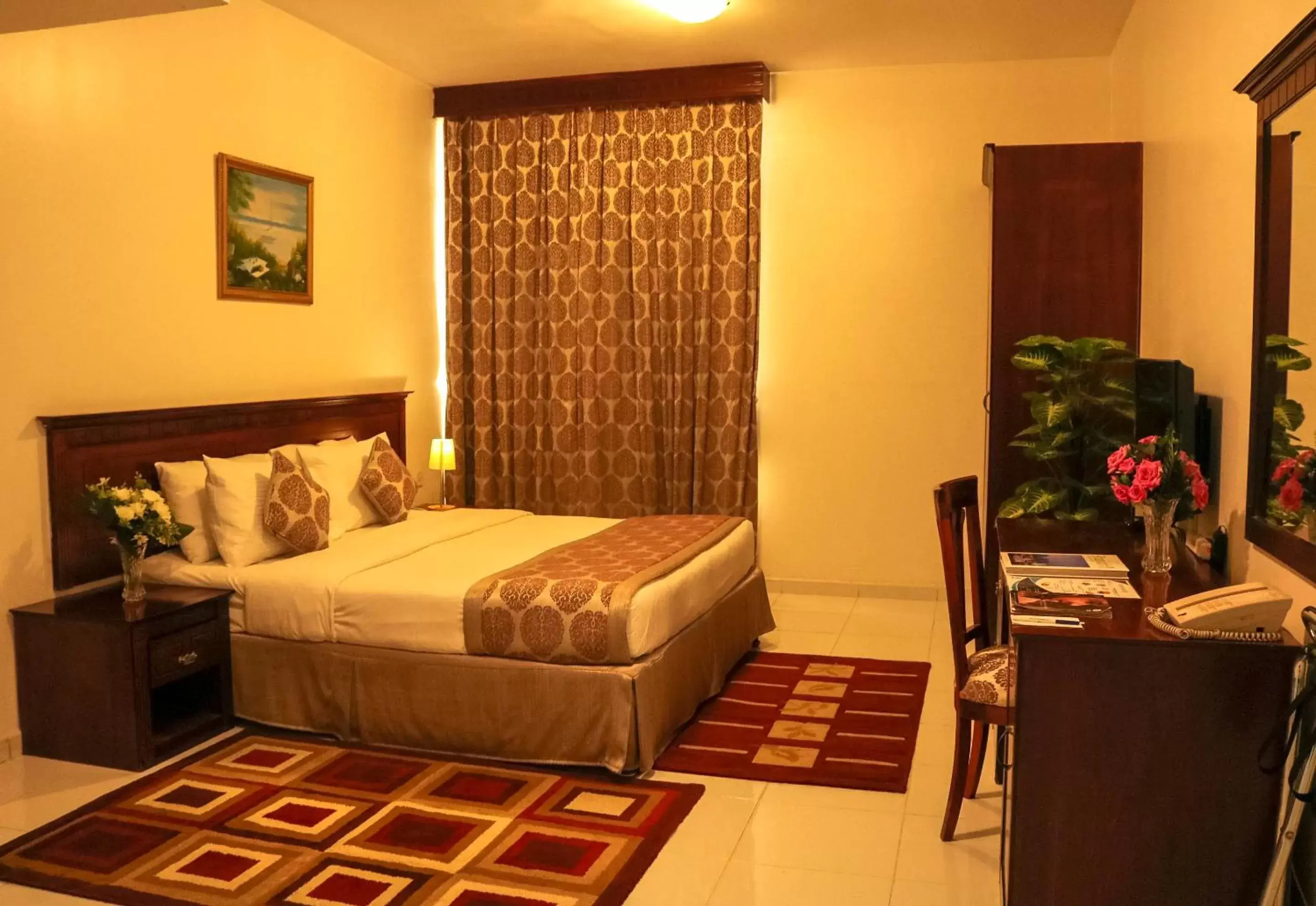 Bedroom, Bed in Al Maha Regency Hotel Suites - Managed by Aoudi Consultants Bedroom, Bed in Al Maha Regency Hotel Suites - Managed by Aoudi Consultants