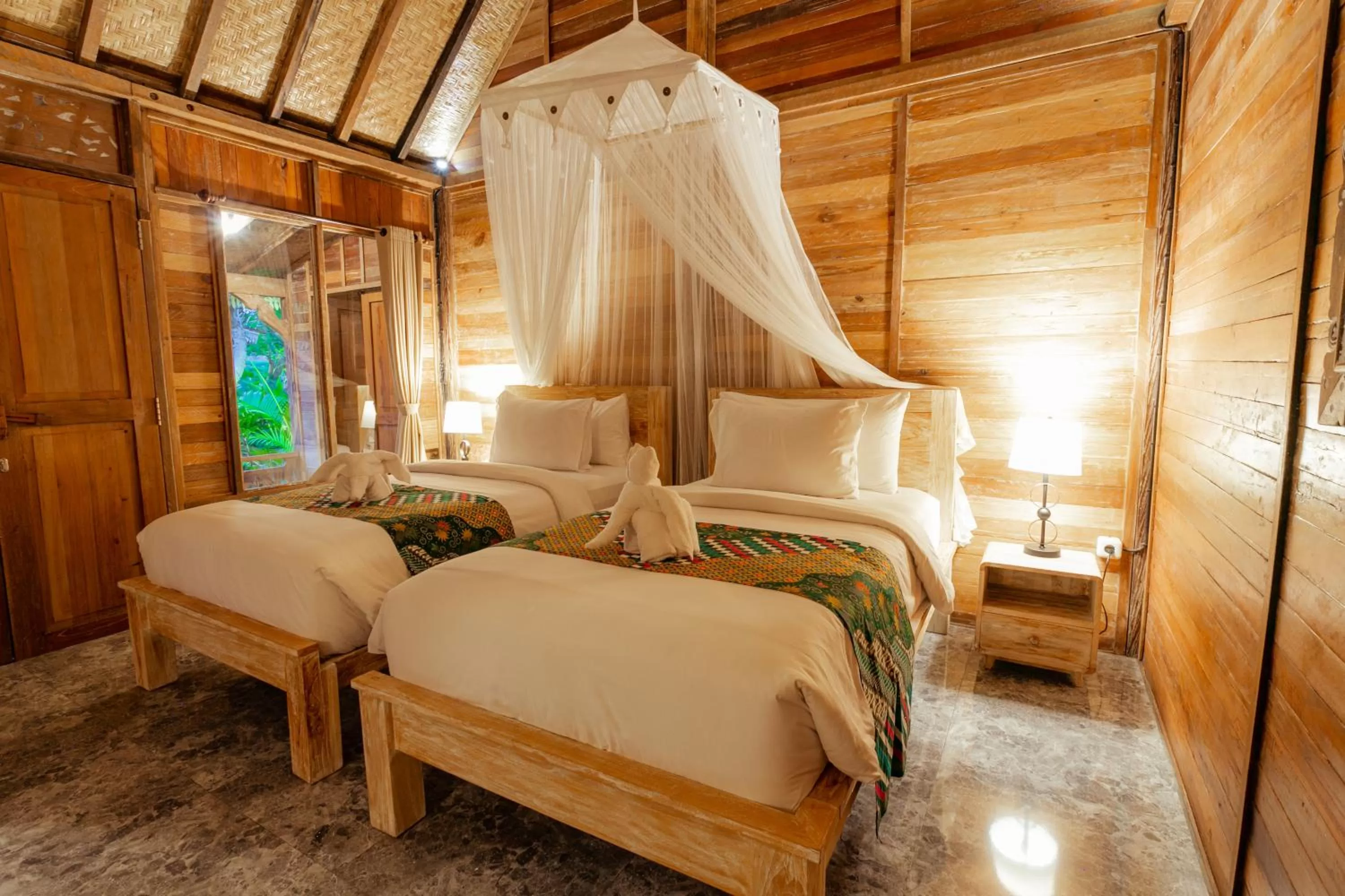 Bed in Nauna Villa Ubud