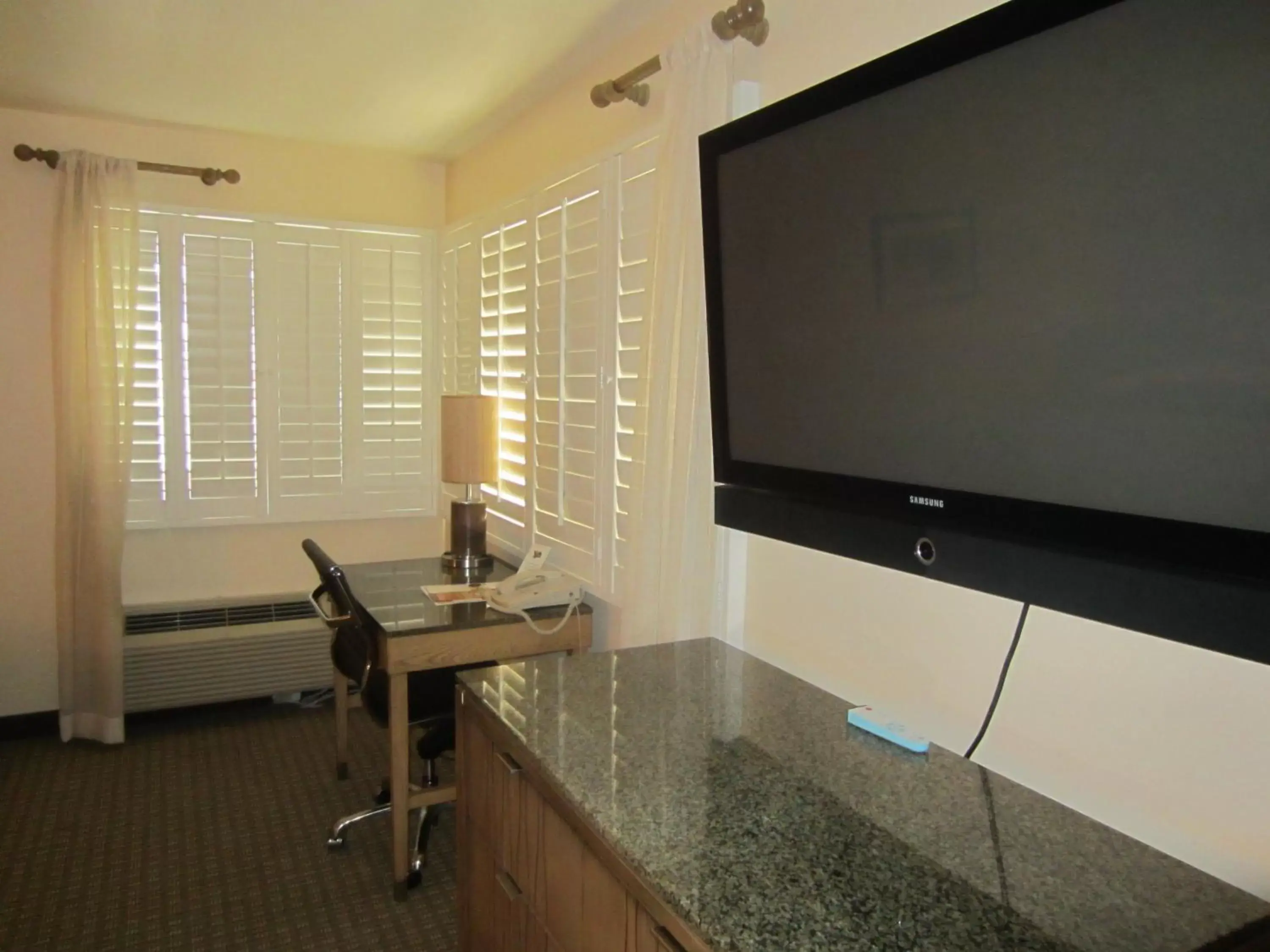 TV and multimedia, TV/Entertainment Center in PB Surf Beachside Inn