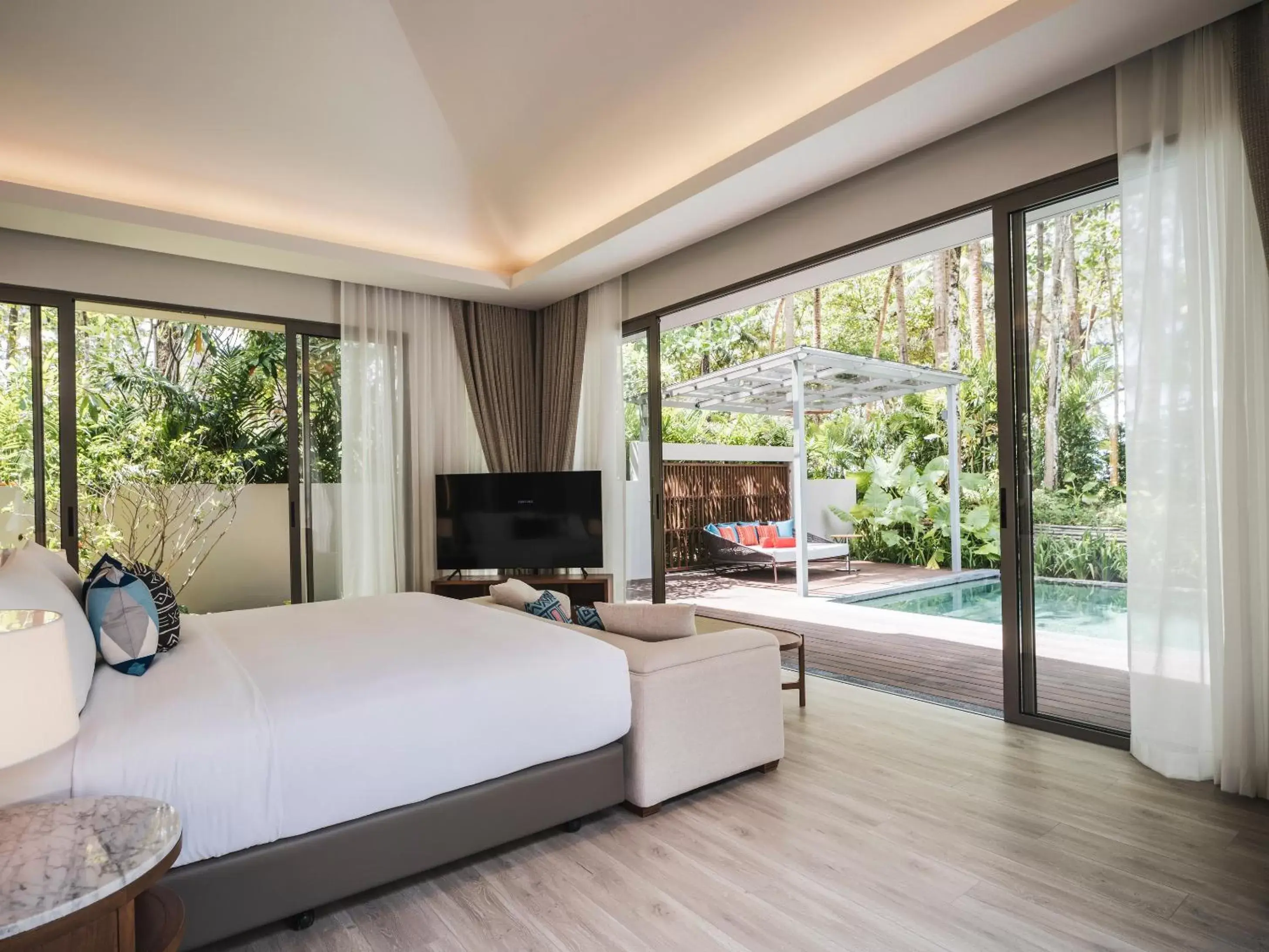 Bed in Avani Plus Khao Lak Resort