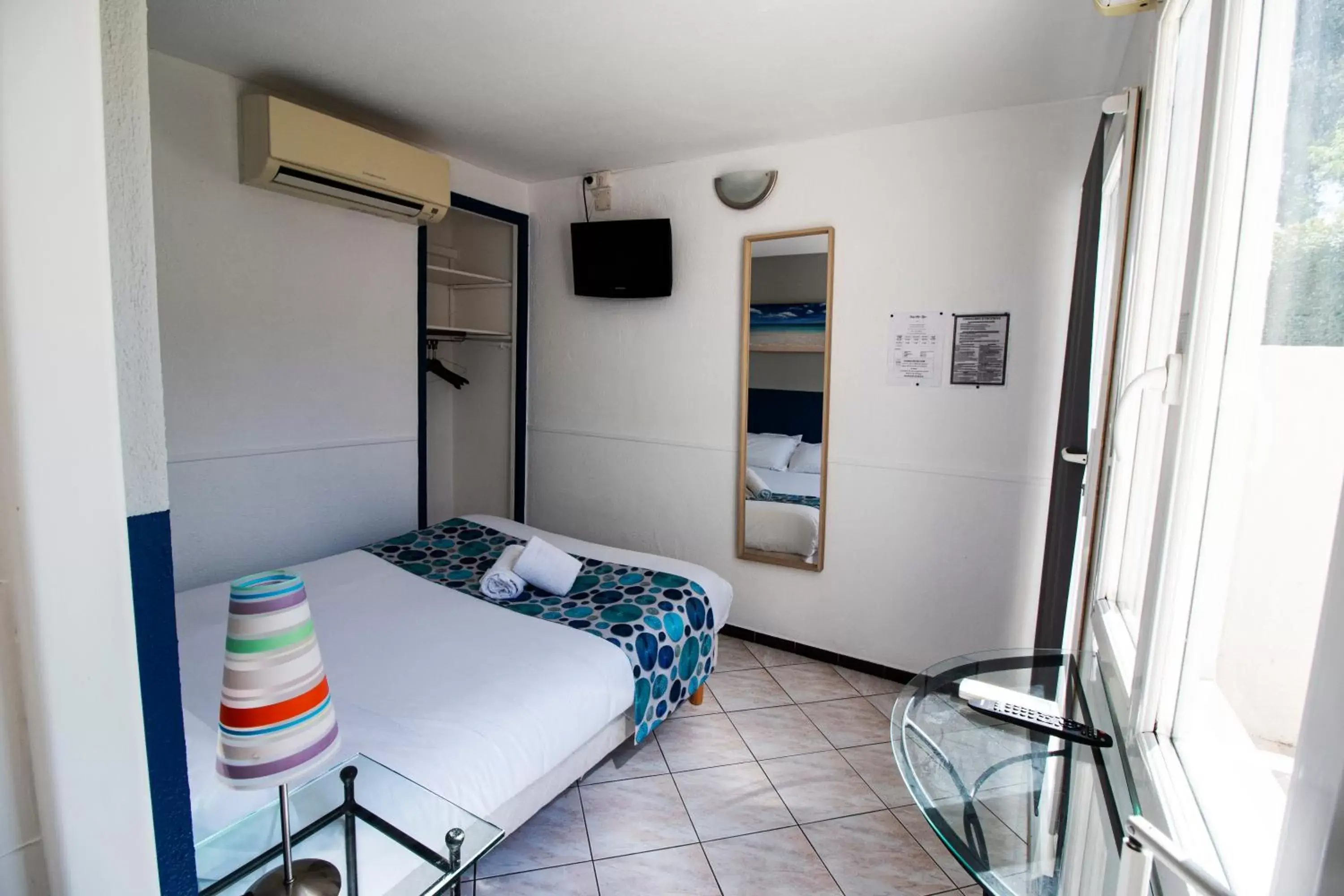 Bedroom in Hôtel Bel Azur
