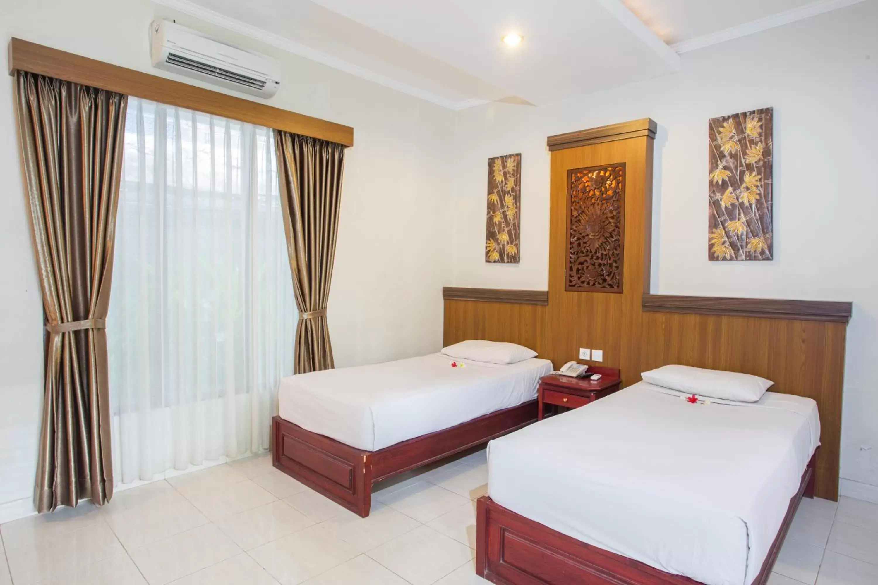 Bedroom, Bed in Sinar Bali Hotel