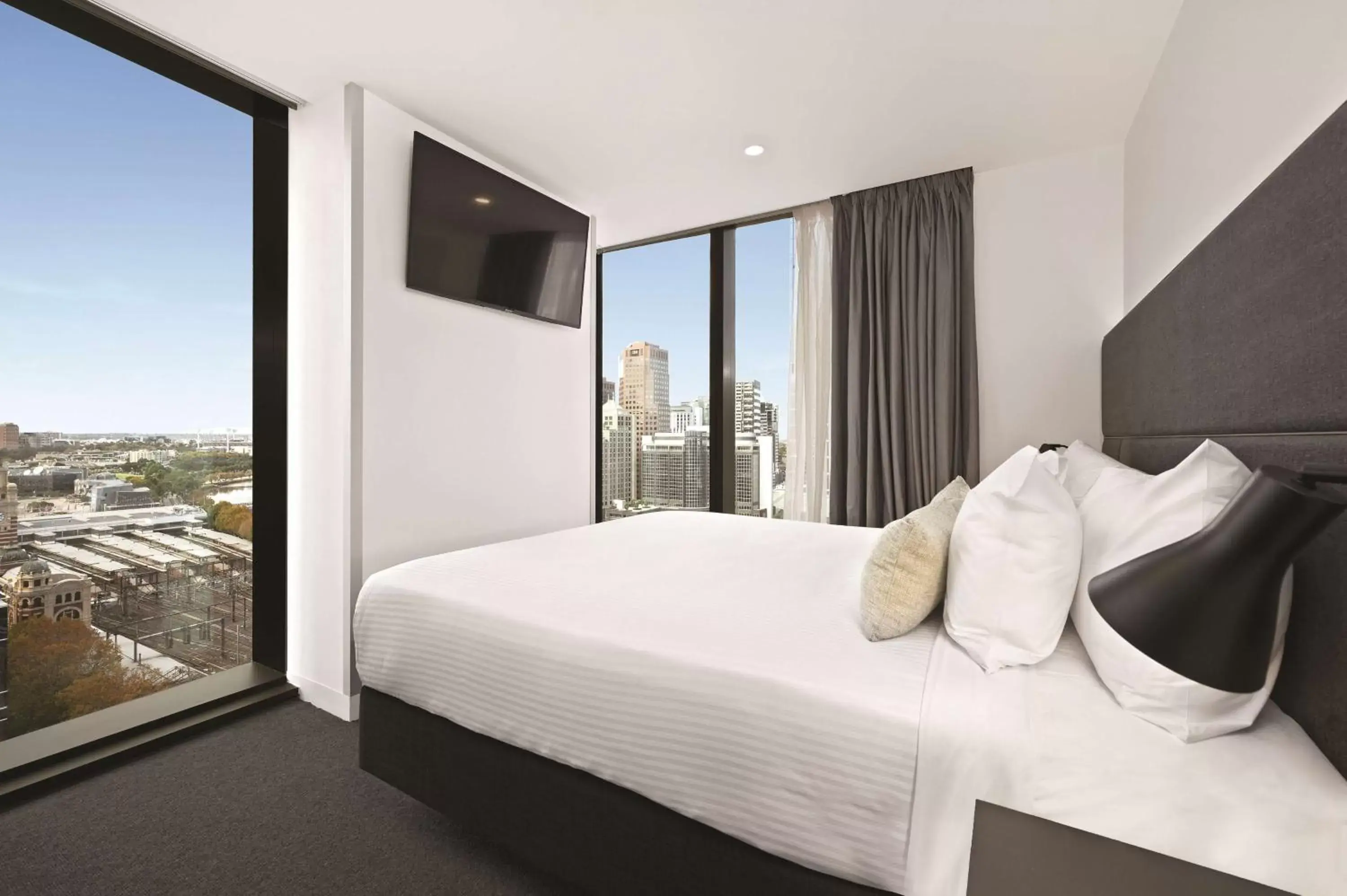 Bedroom in Vibe Hotel Melbourne