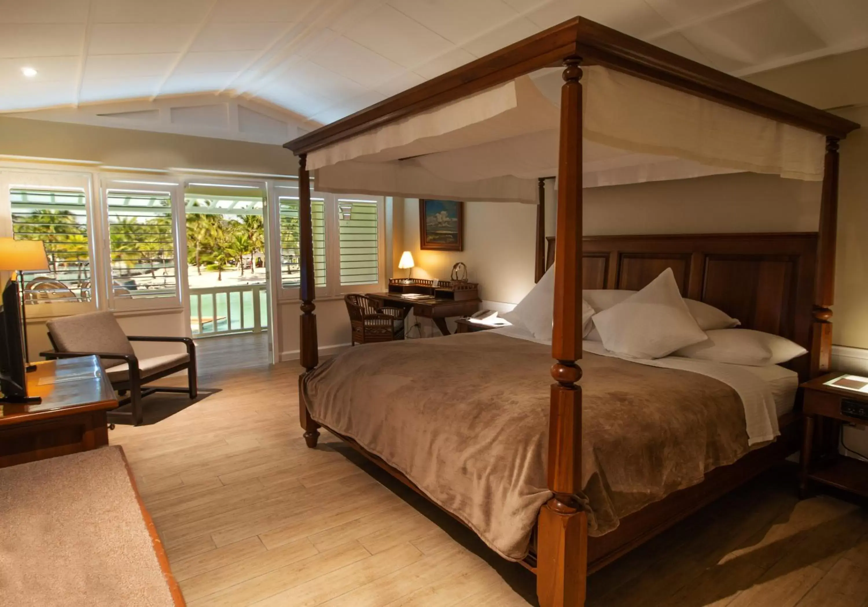 Bed in Plantation Bay Resort and Spa