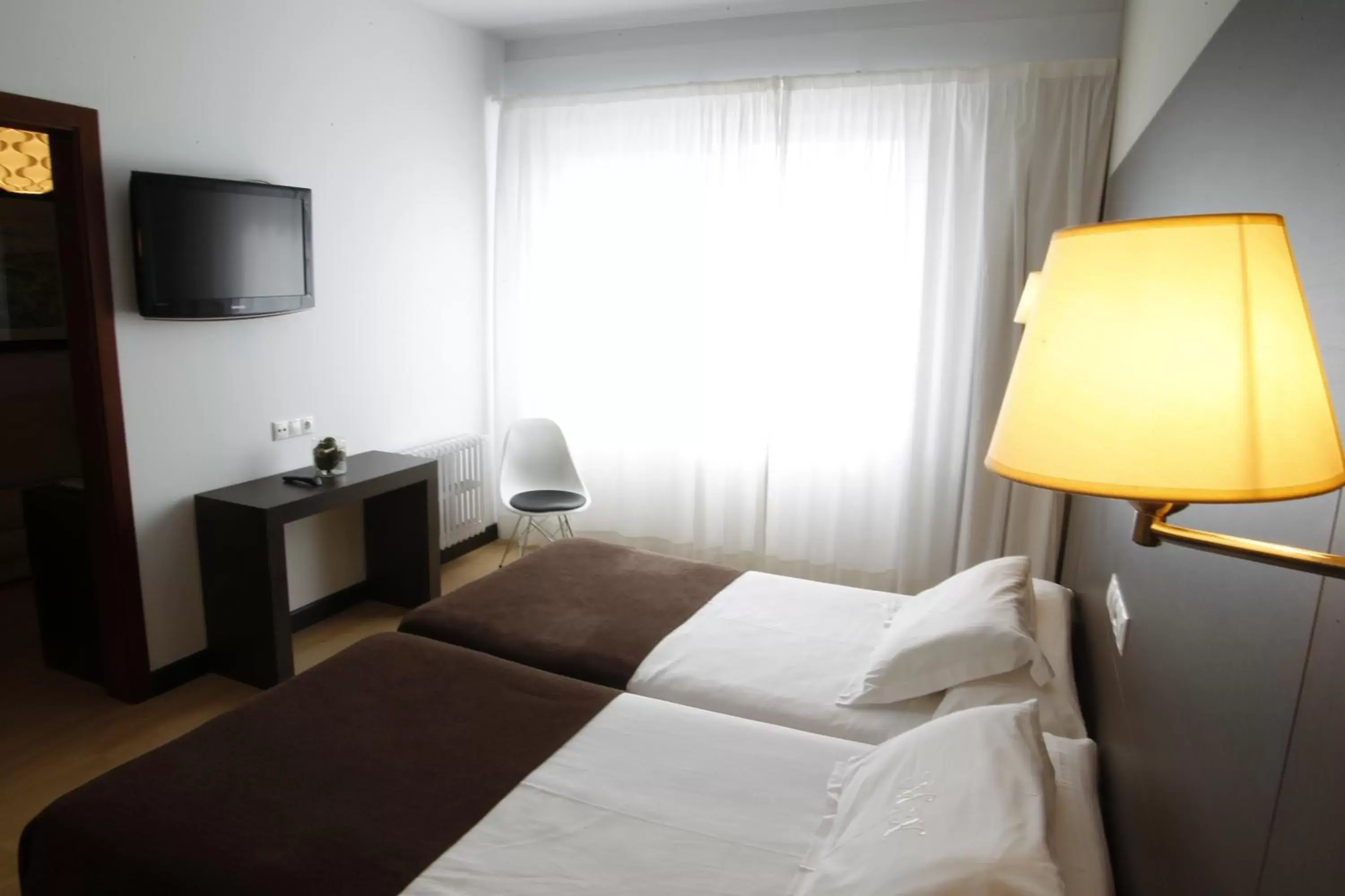 Bed in Hotel Mendez Nuñez