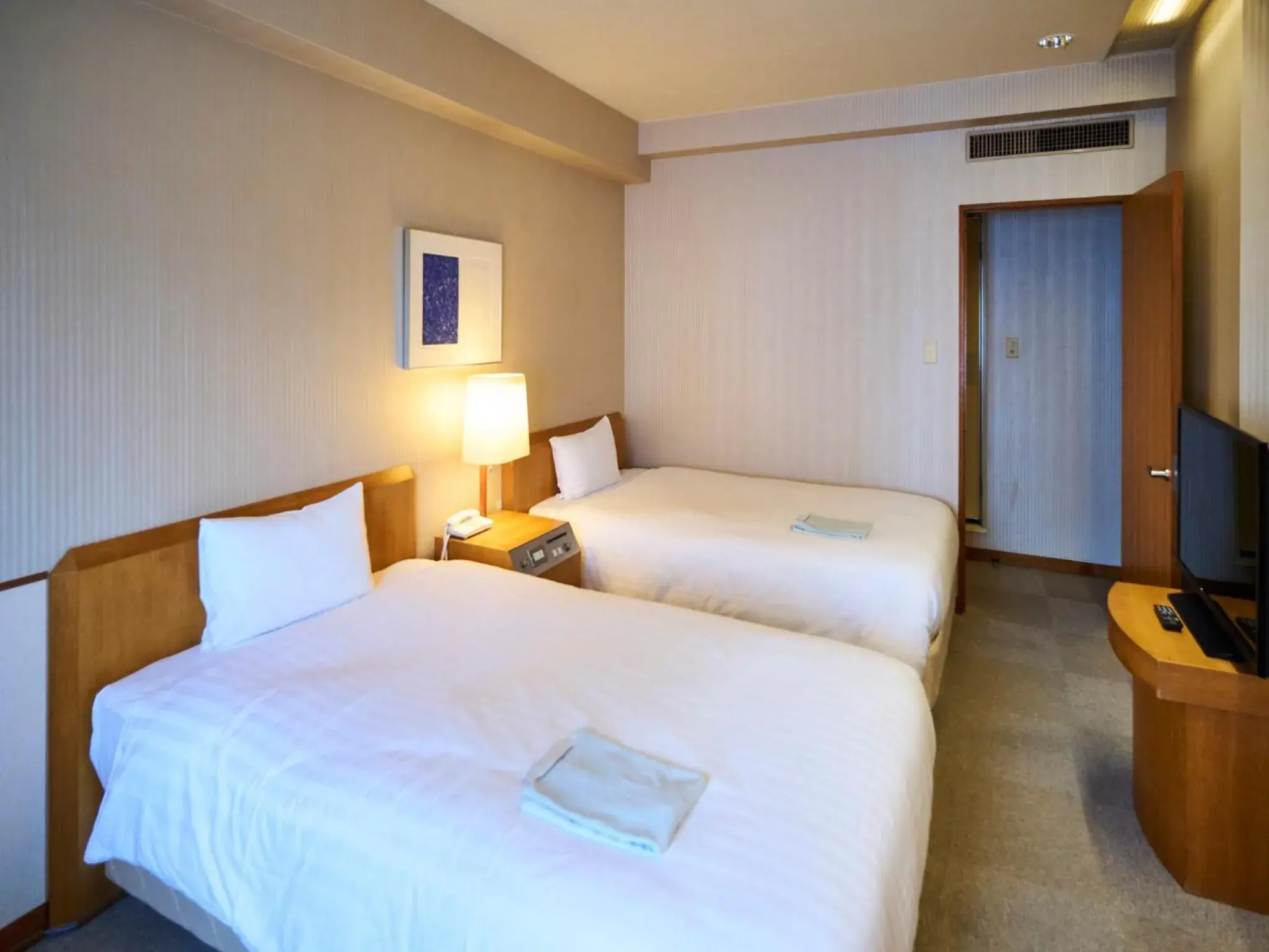 Bed in Court Hotel Fukuoka Tenjin