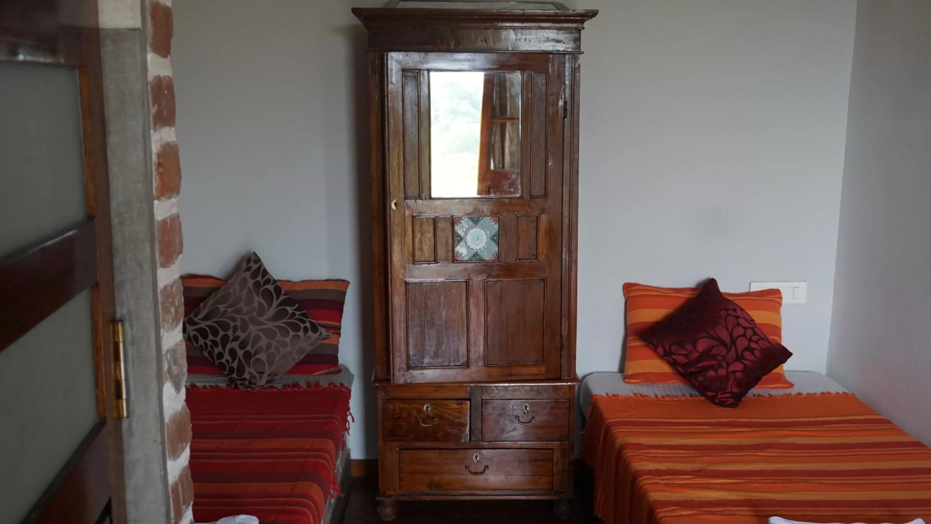 Bed, Seating Area in Green's Guest House