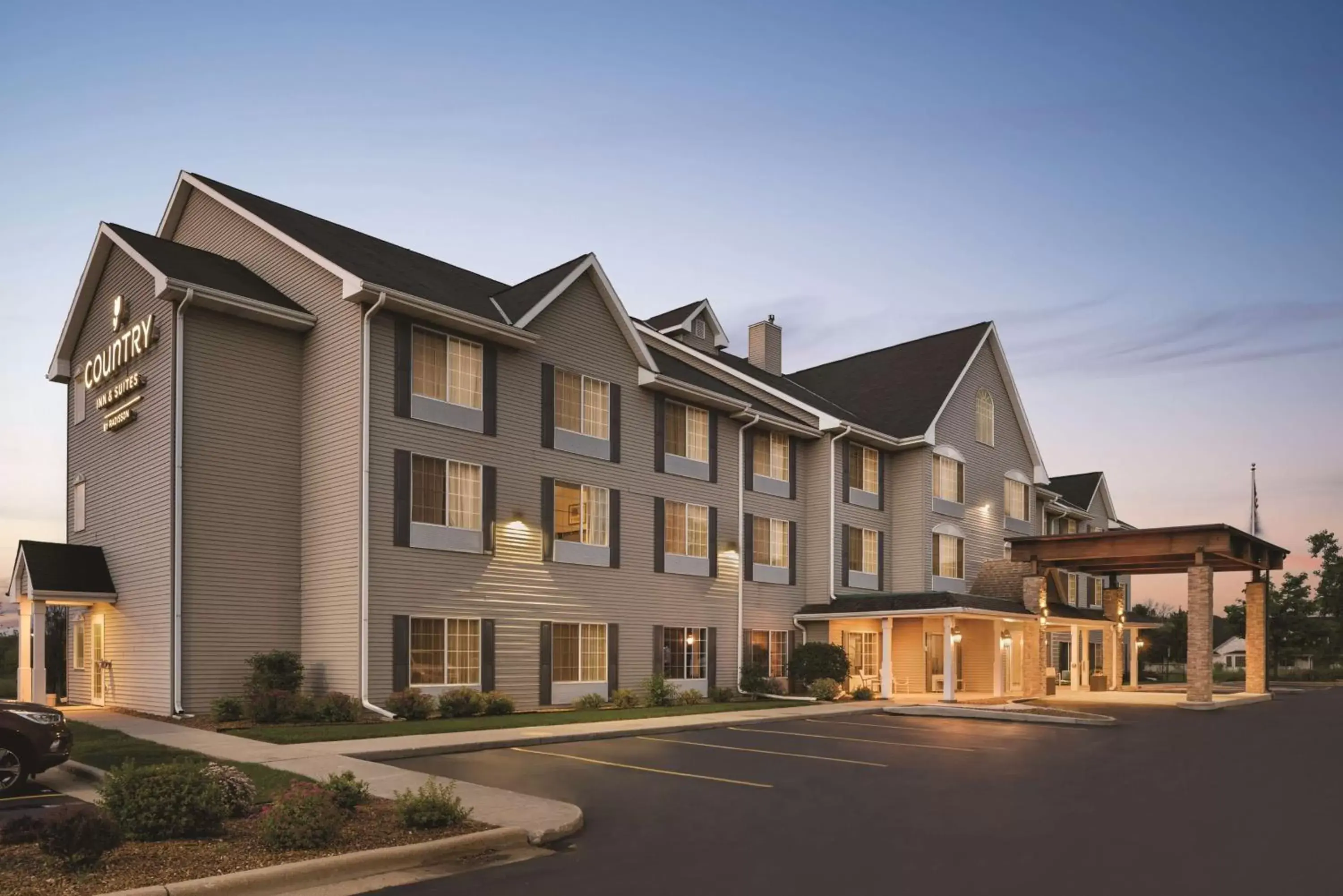 Property Building in Country Inn & Suites by Radisson, West Bend, WI