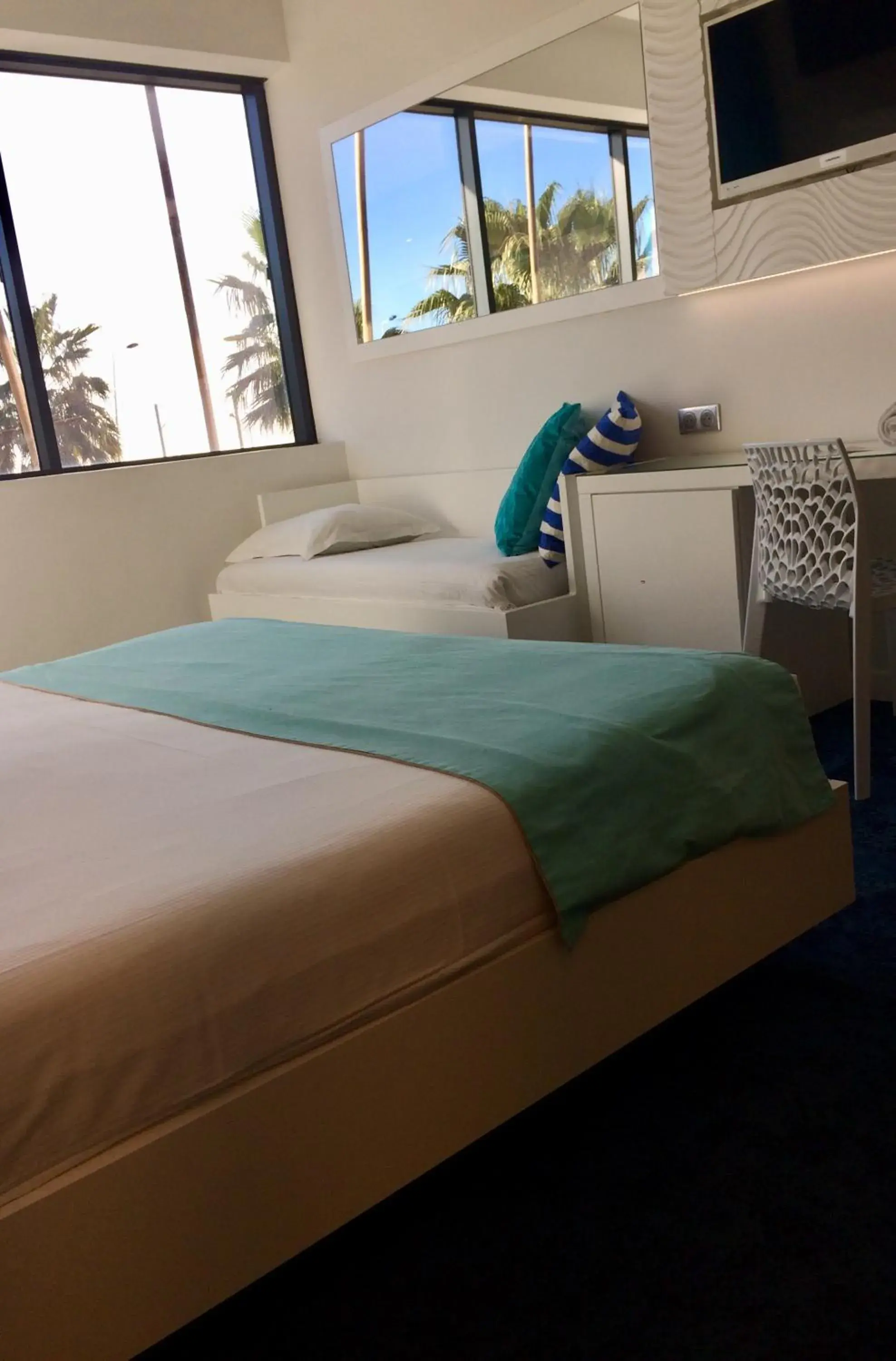 Bed in Marineland Hôtel