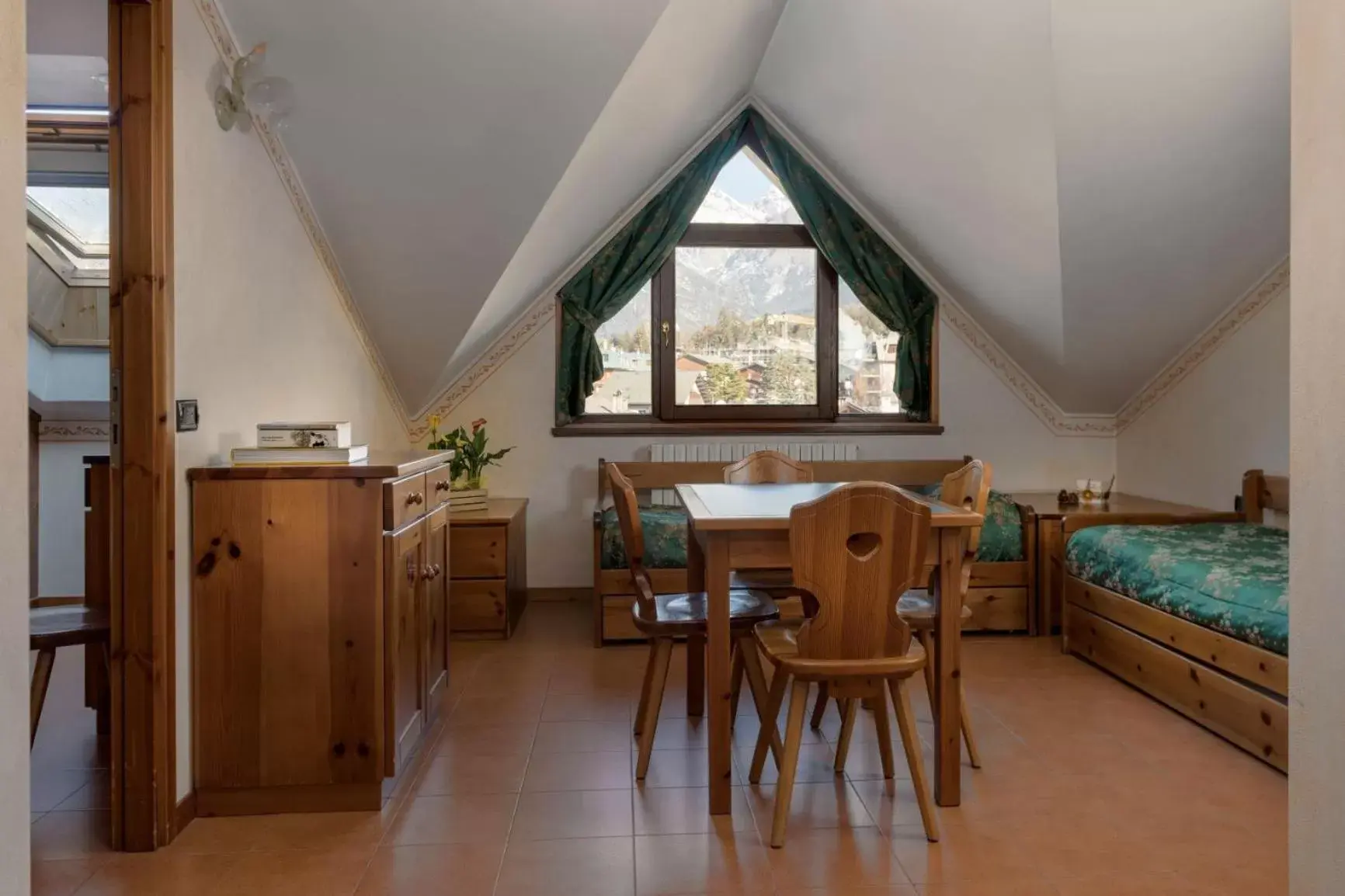 Bedroom, Dining Area in Hotel Cristallo