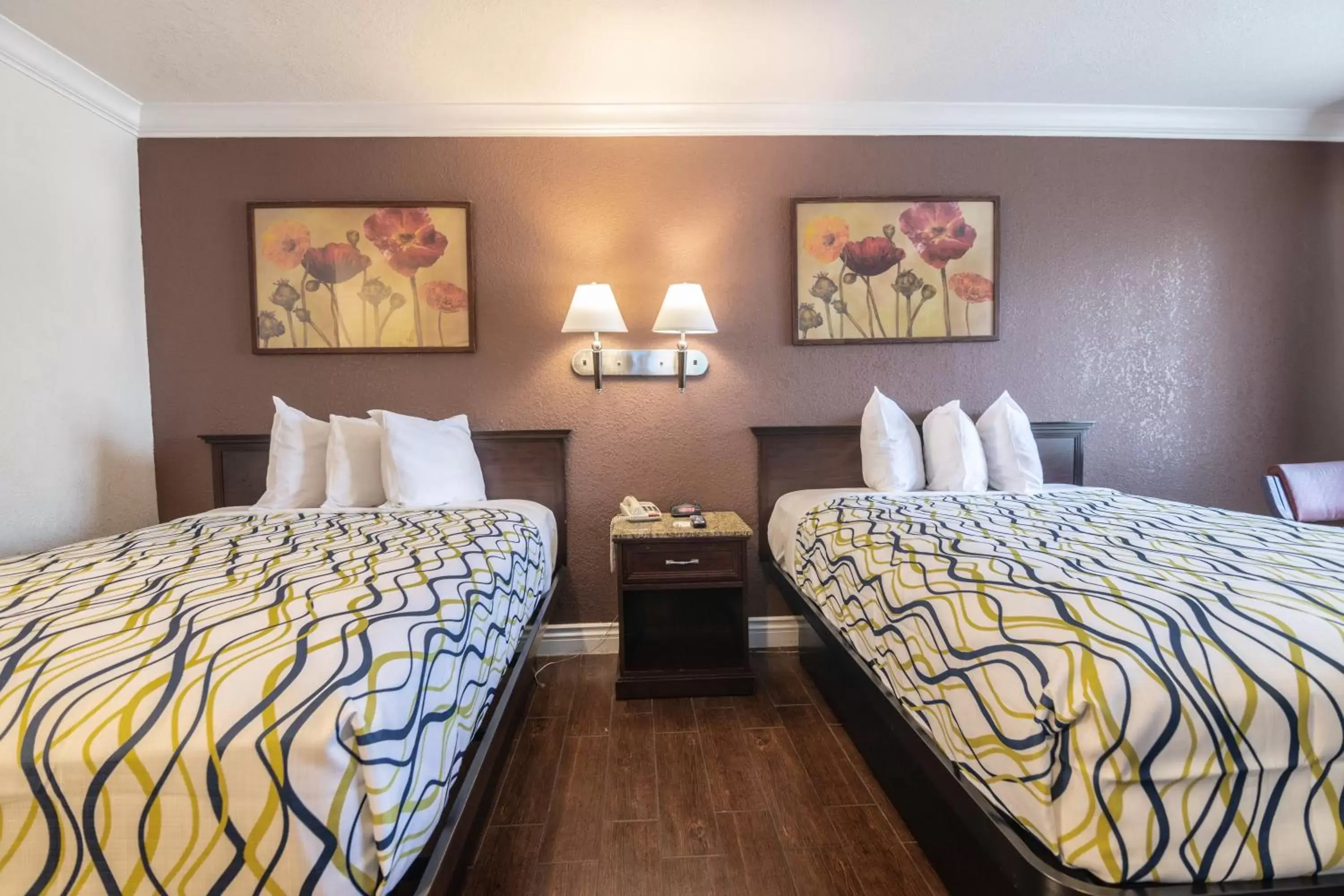 Bed in Hospitality Inn
