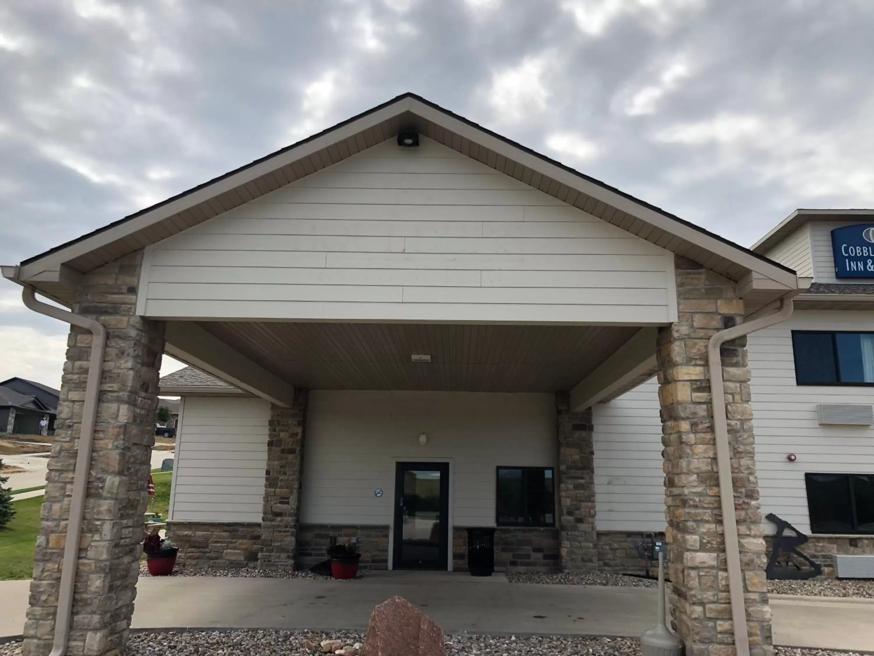 Facade/entrance in Cobblestone Inn & Suites - Denison | Oak Ridge