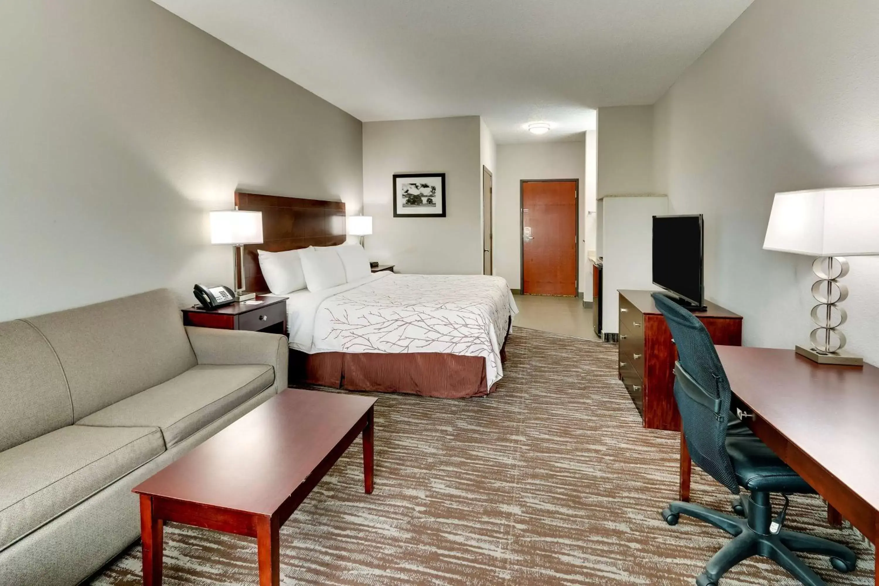 Bedroom in Best Western PLUS University Inn & Suites