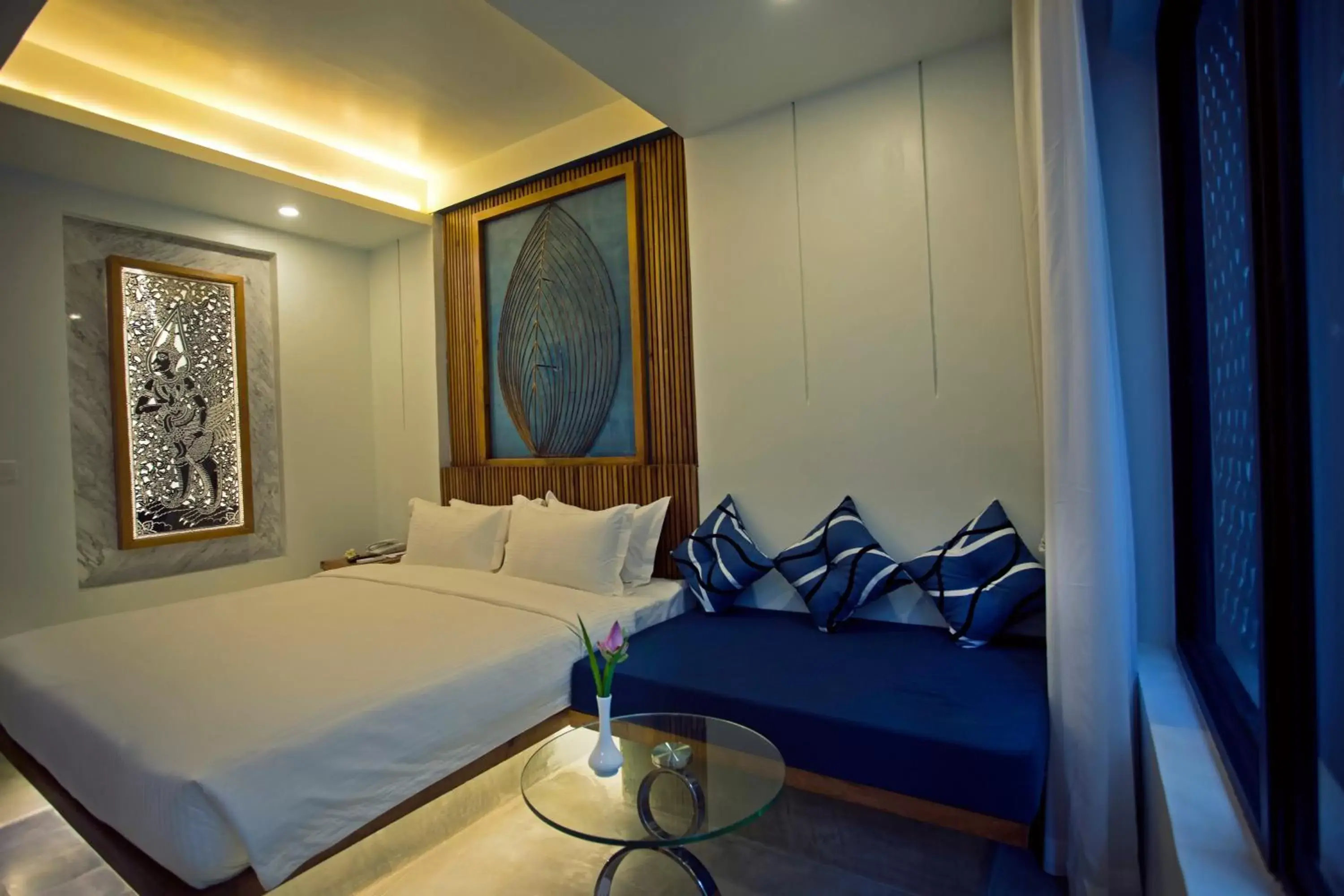 Seating area, Bed in HARI Residence & Spa