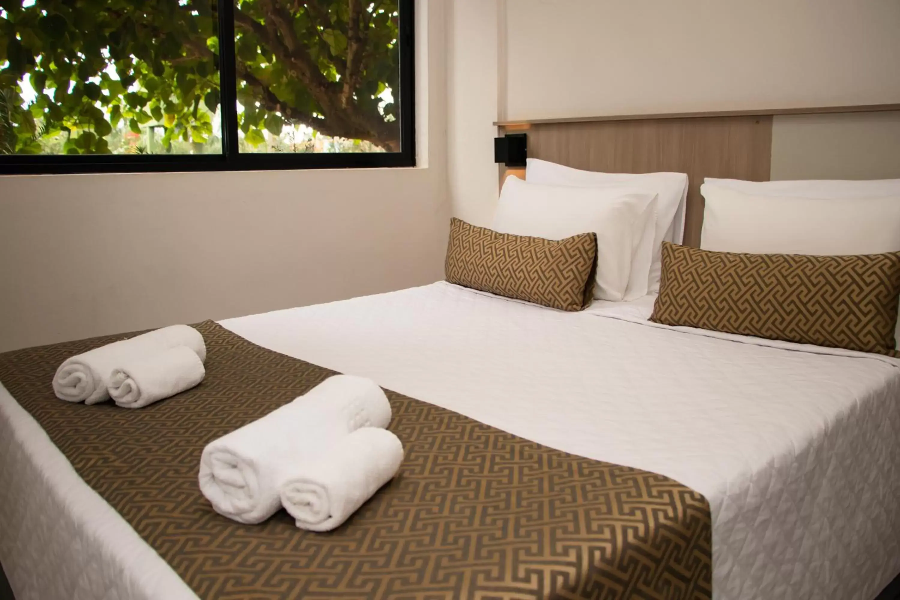 Bed in Iguassu Express Hotel