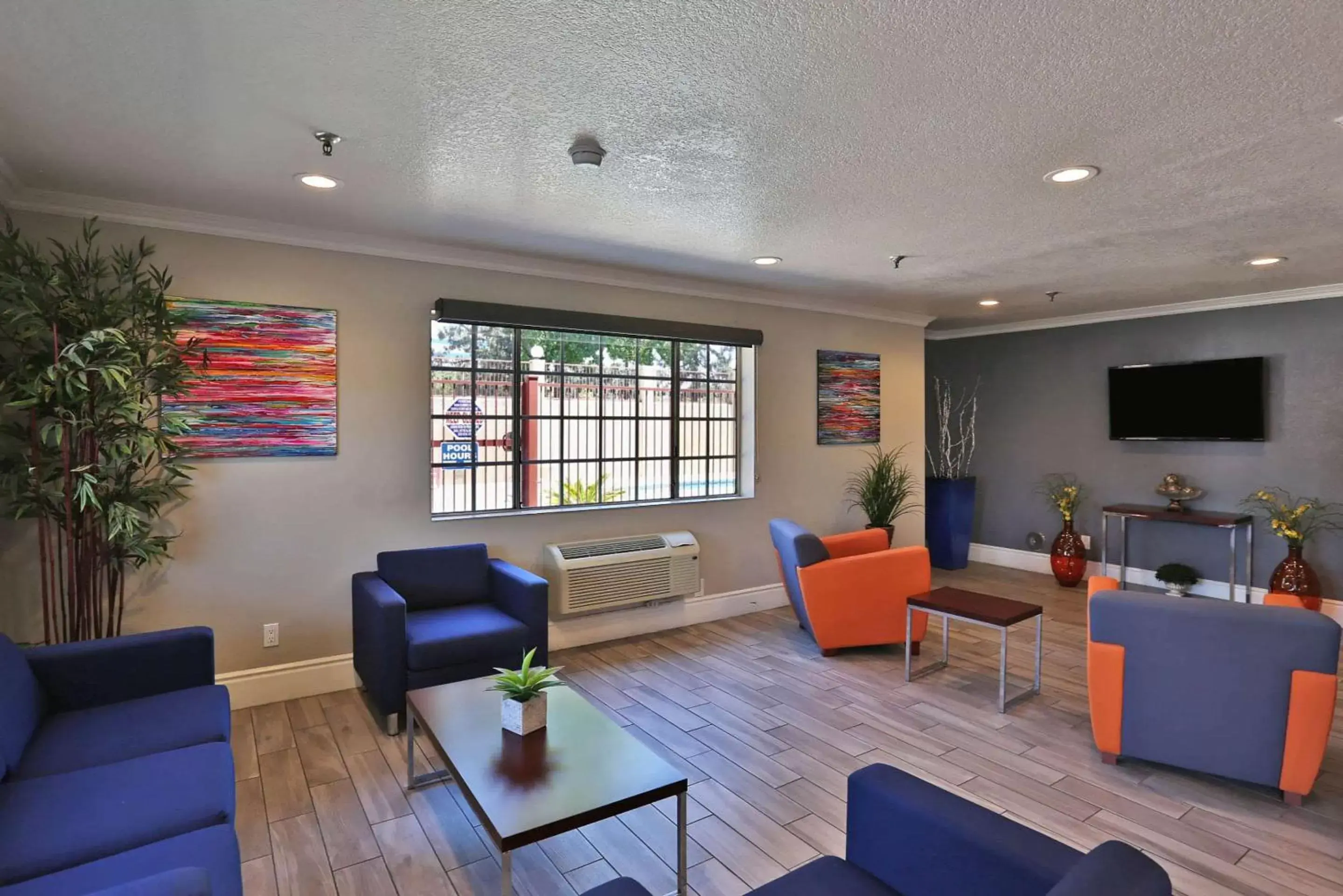 Lobby or reception, Seating Area in SureStay Hotel by Best Western Fontana