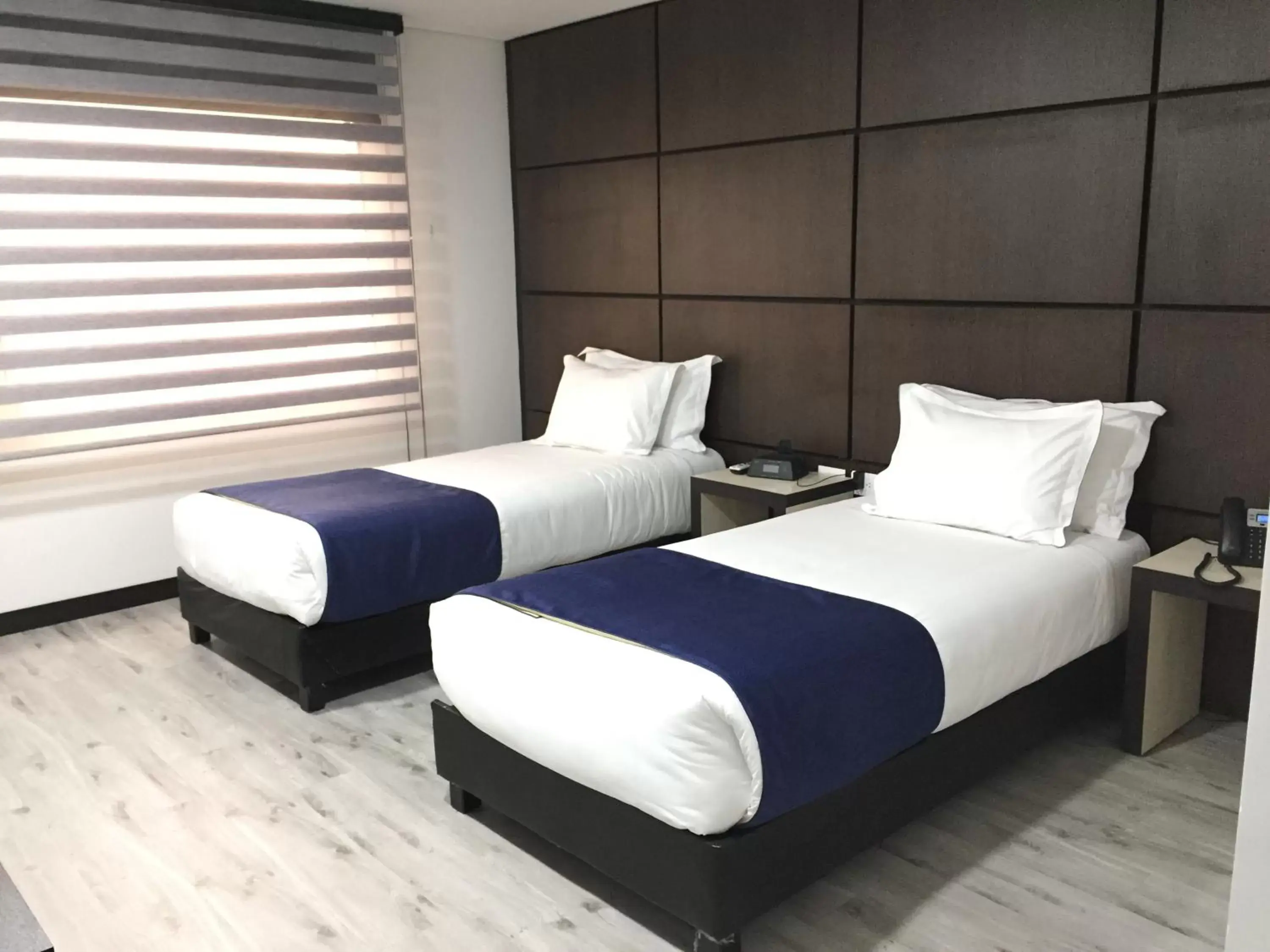 Bed in Hotel American Visa Tower