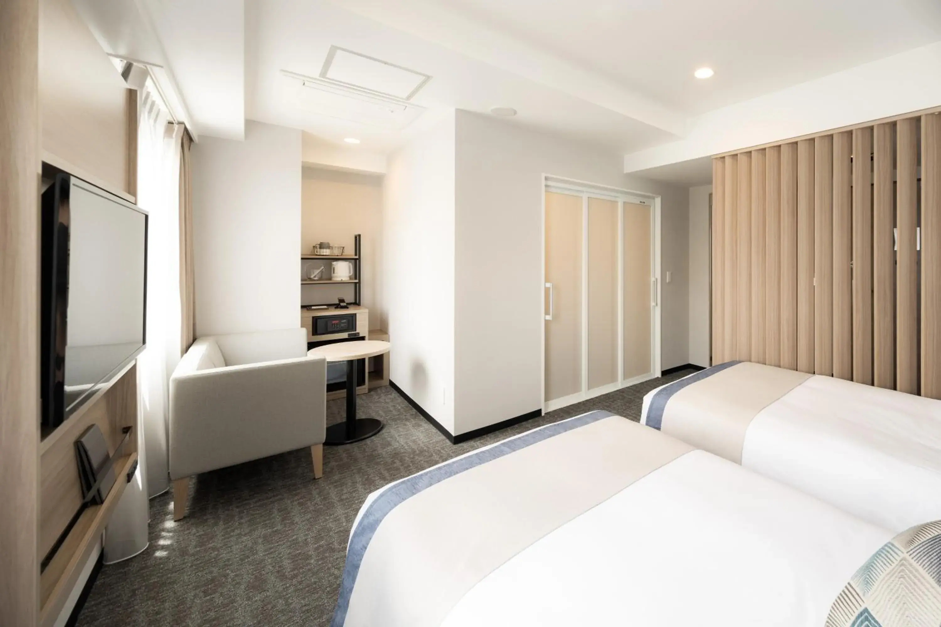 Bedroom, Bed in Tissage Hotel Naha by Nest