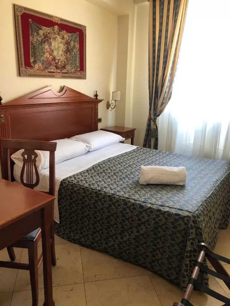 Bed in D'Angelo Palace Hotel