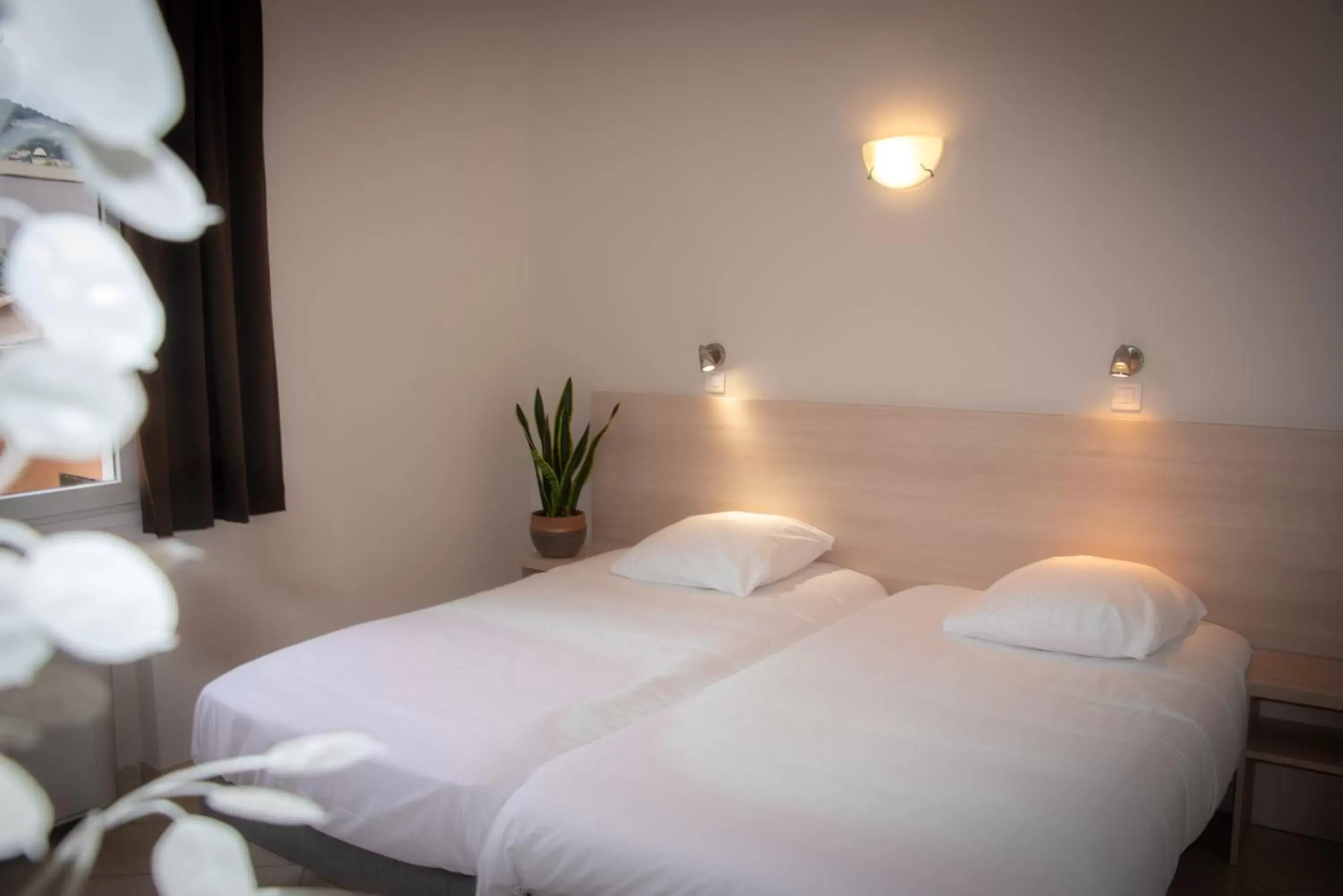 Bed in Hotel et Appartements Reine D'Azur