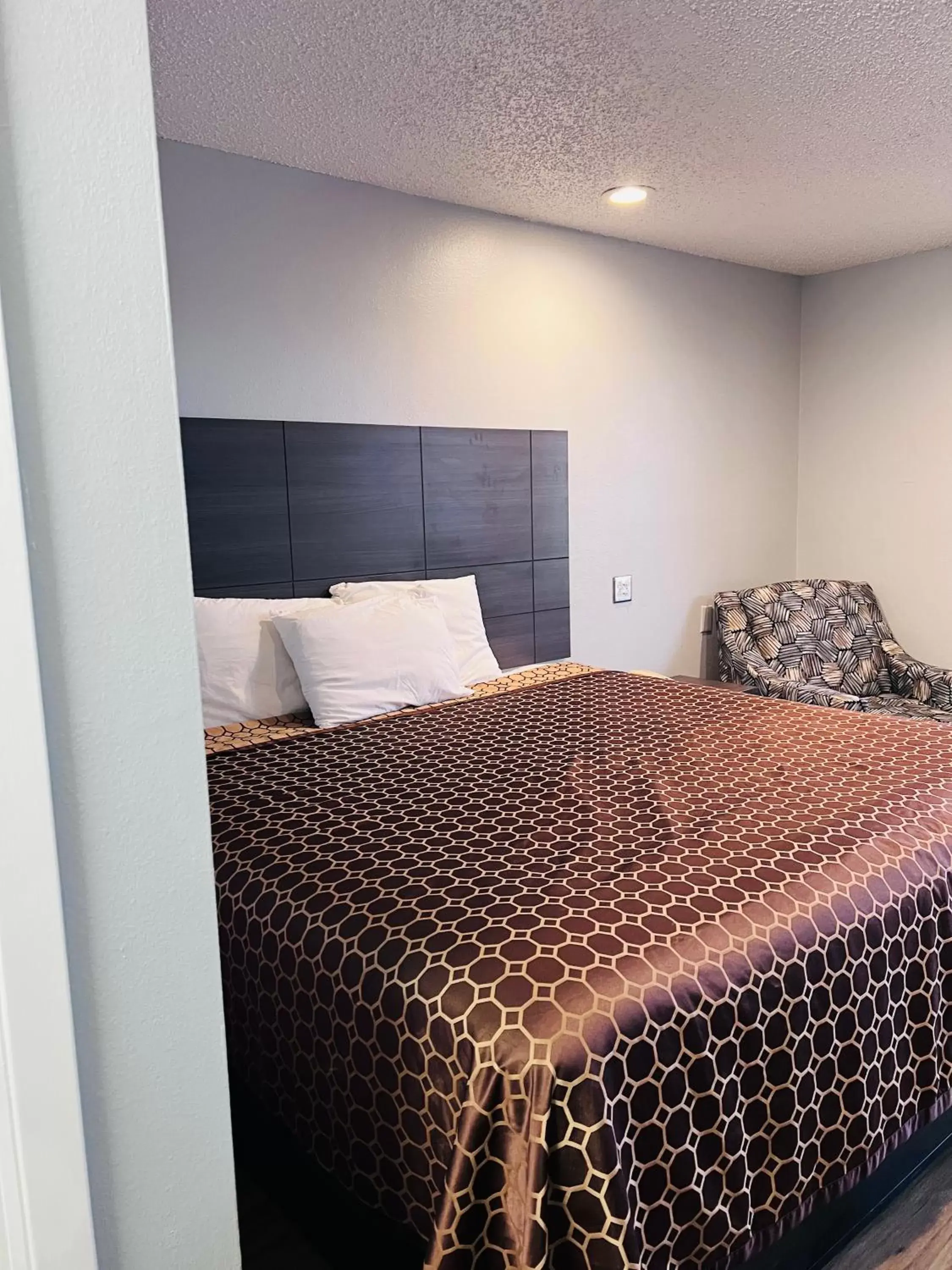 Bed in Coachway Inn Bed in Coachway Inn