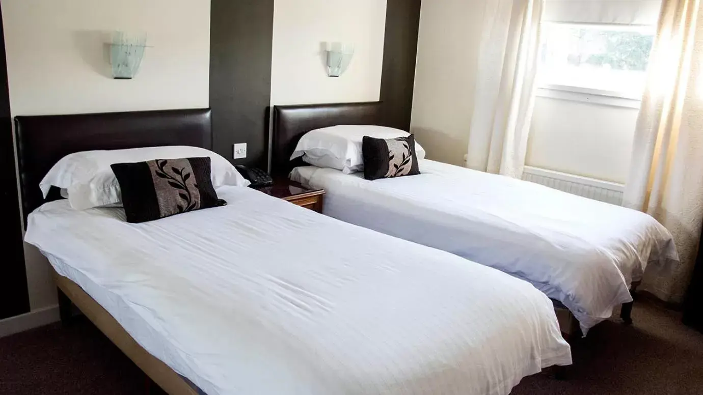 Bed in Avonbridge Hotel