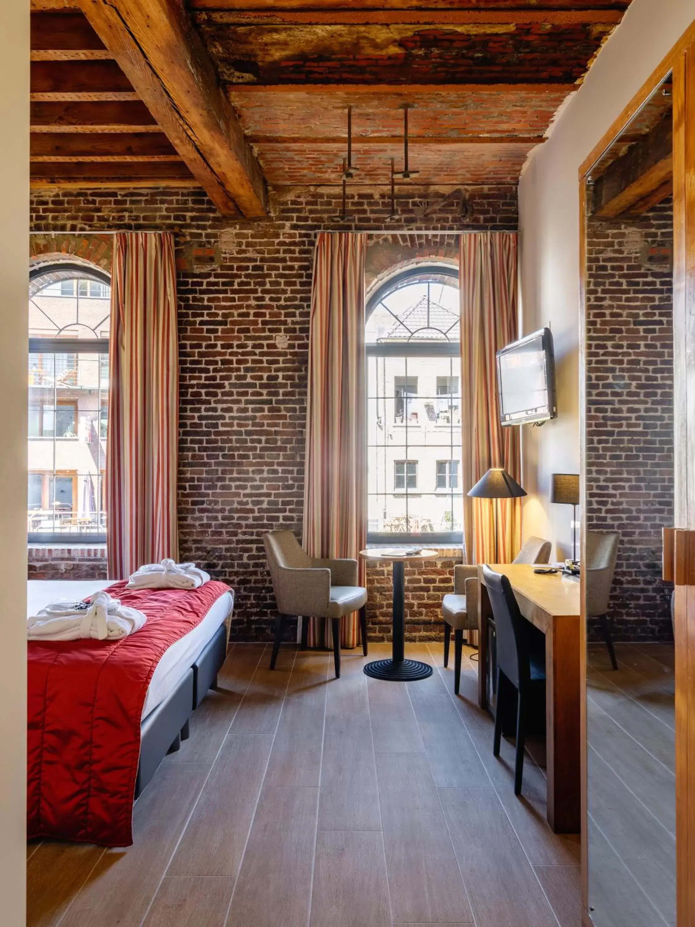 Bedroom in Ghent River Hotel
