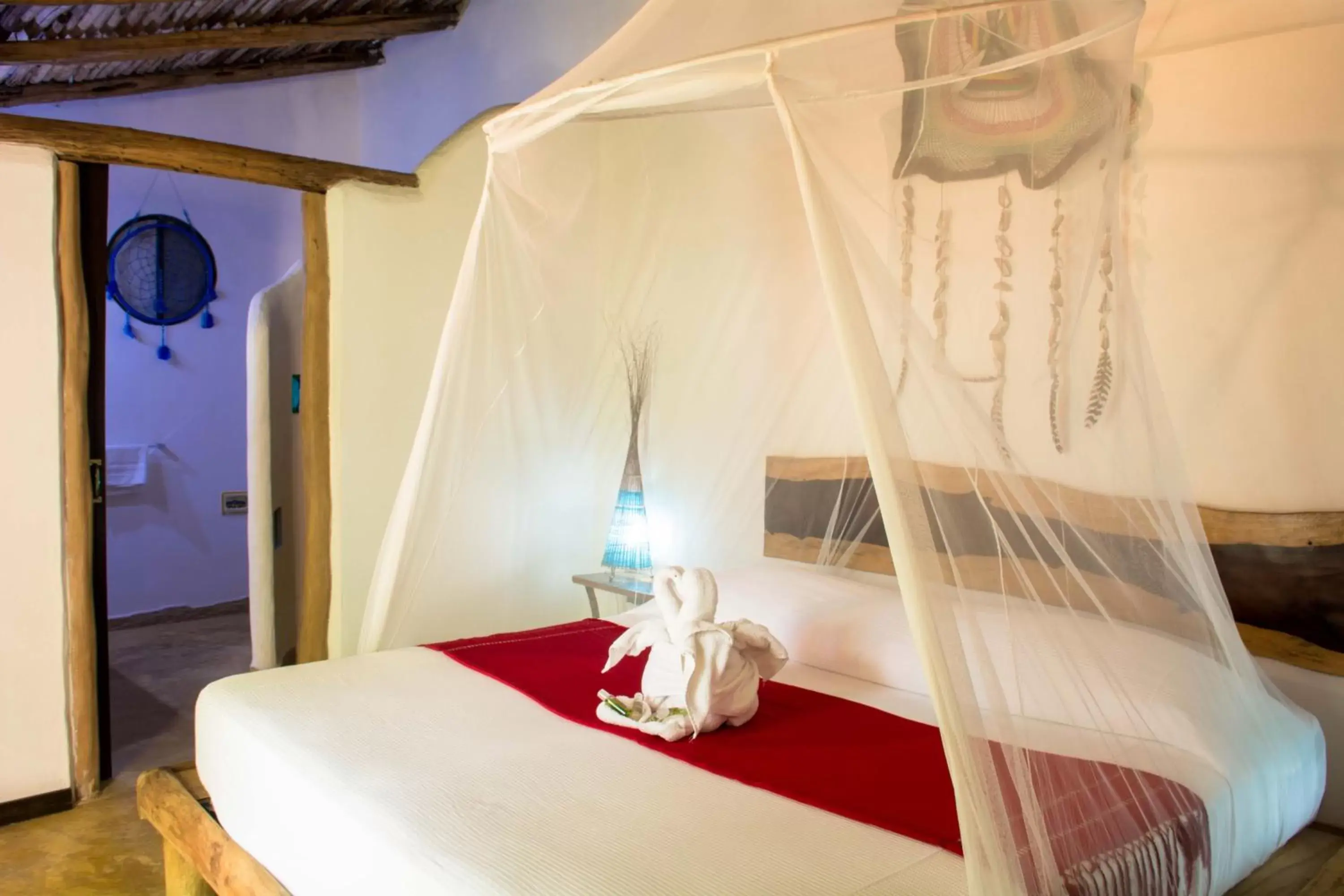 Photo of the whole room, Bed in Pacha Tulum Boutique Hotel