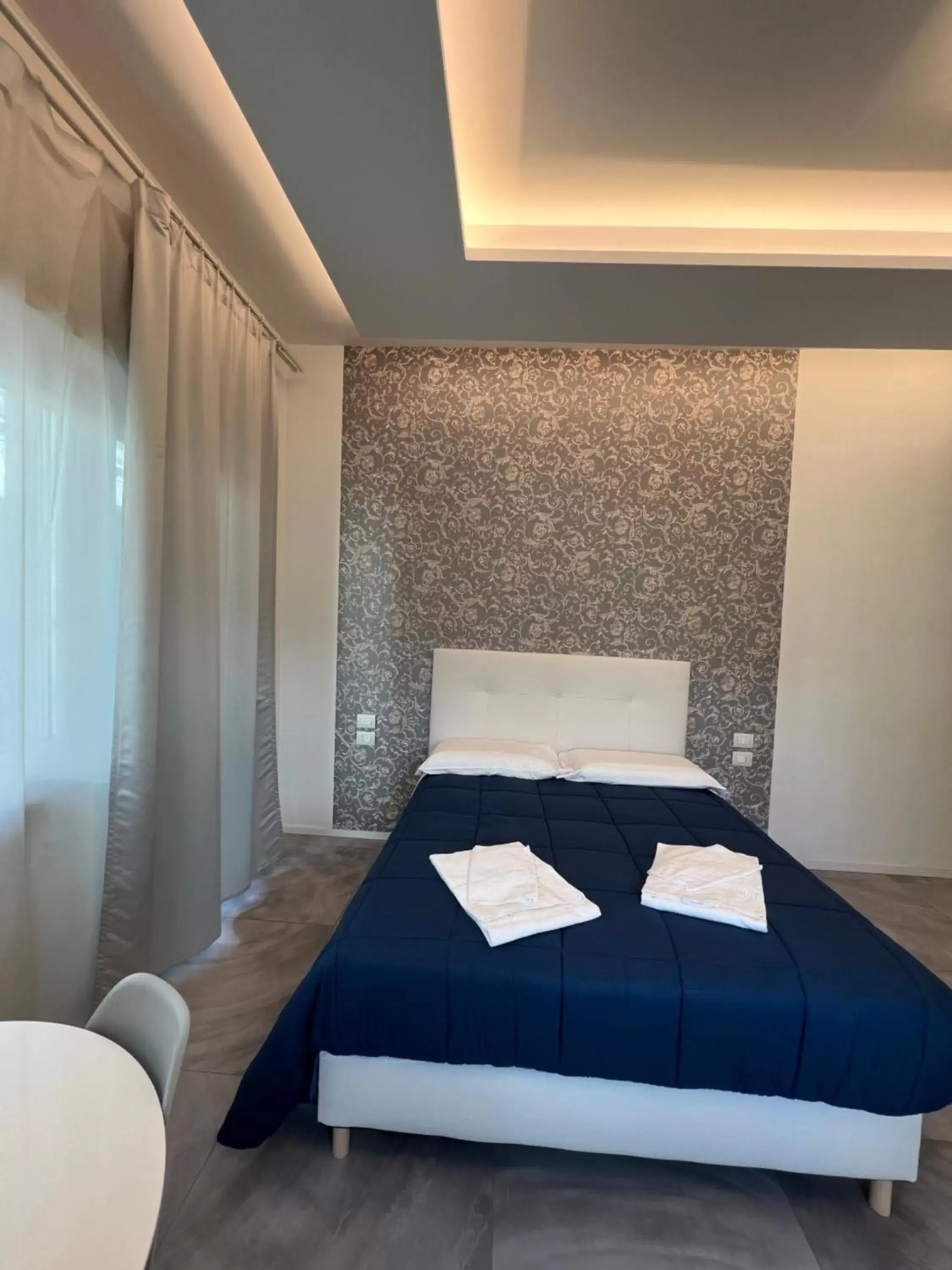 Bed in Relais Vittorio Veneto - Luxotel & Apartotel