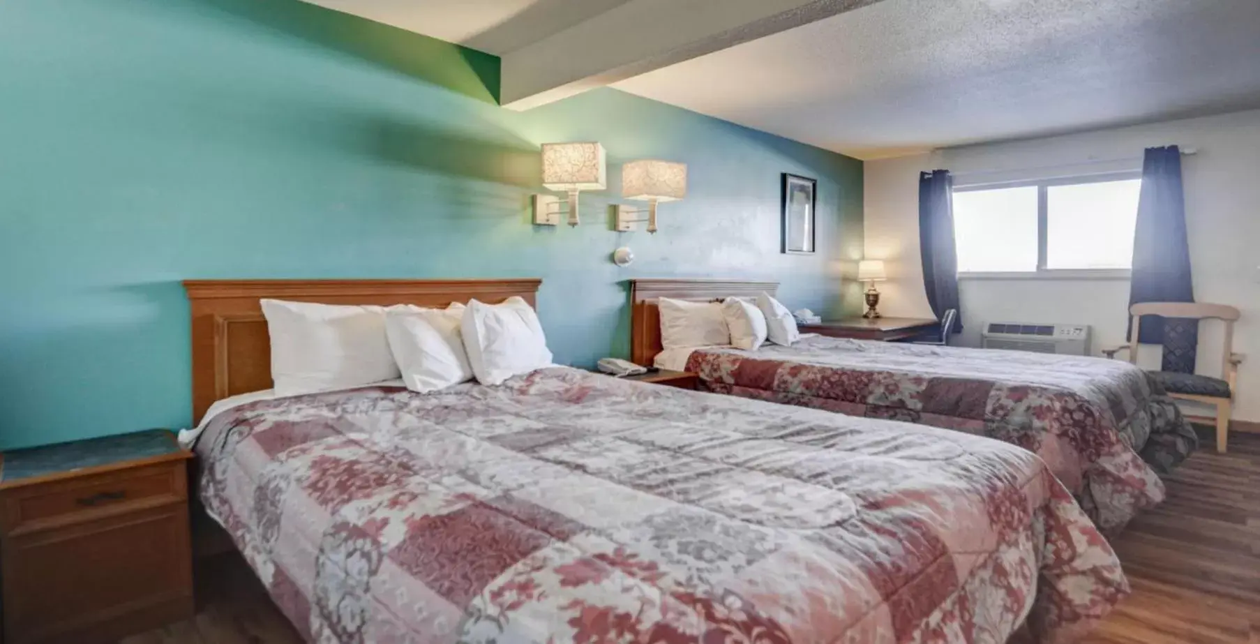 Bed in Americas Best Value Inn Greeley