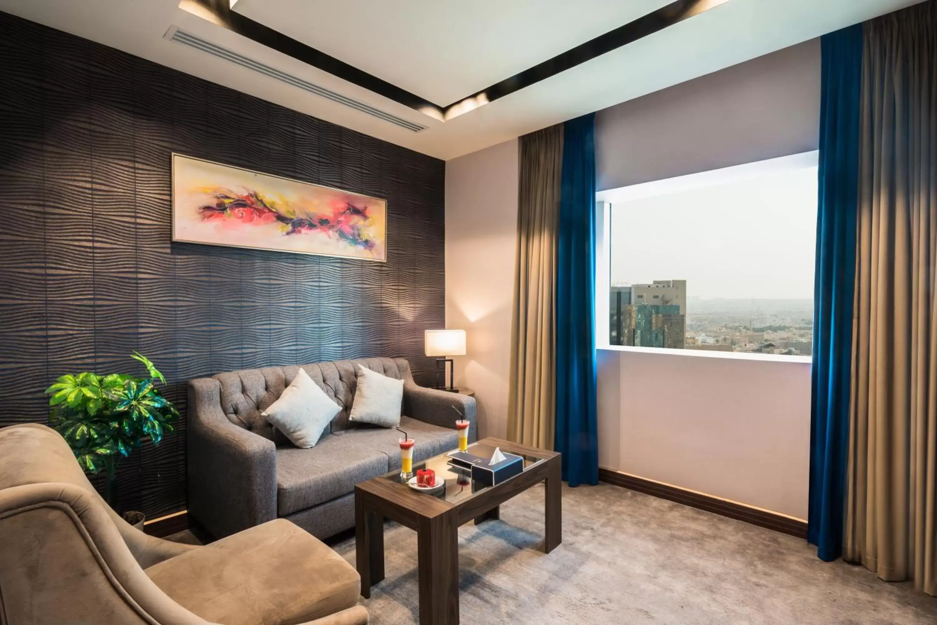 Living room in Al Malqa Elite Hotel Living room in Al Malqa Elite Hotel