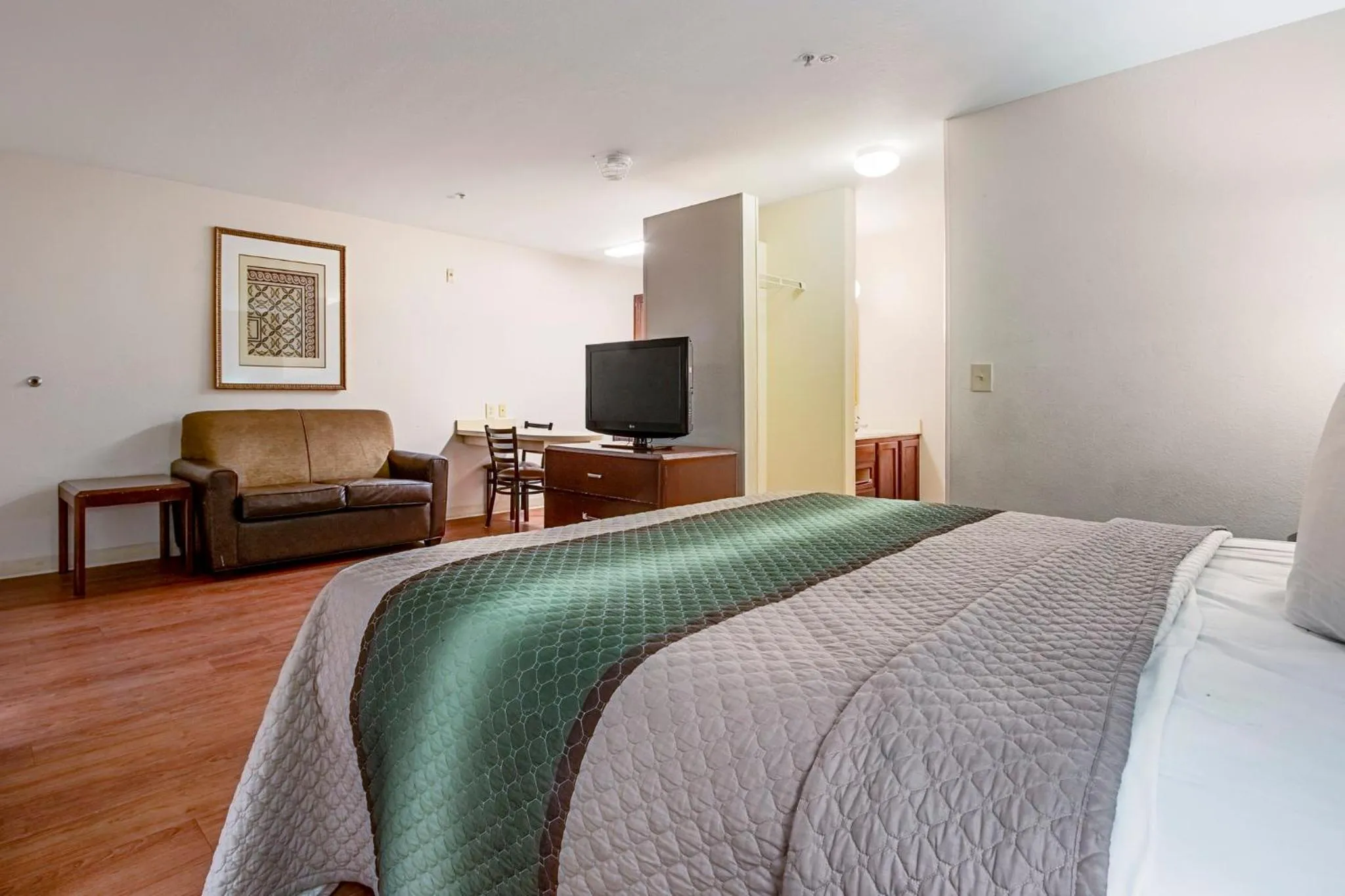 Photo of the whole room, Bed in HomeTowne Studios by Red Roof Phoenix - Black Canyon Highway